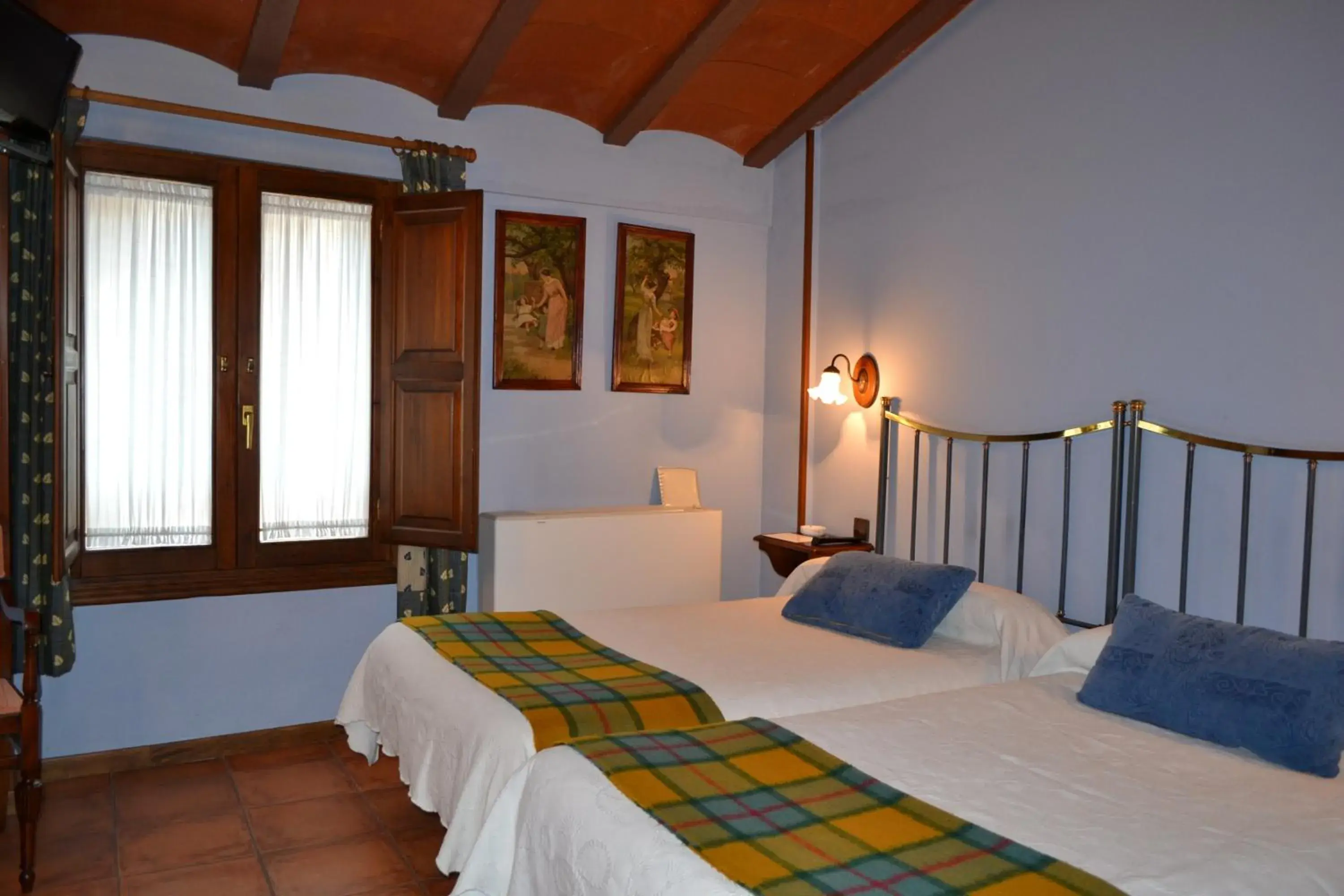 Quadruple Room in Hostal Santa Agueda Quadruple Room in Hostal Santa Agueda