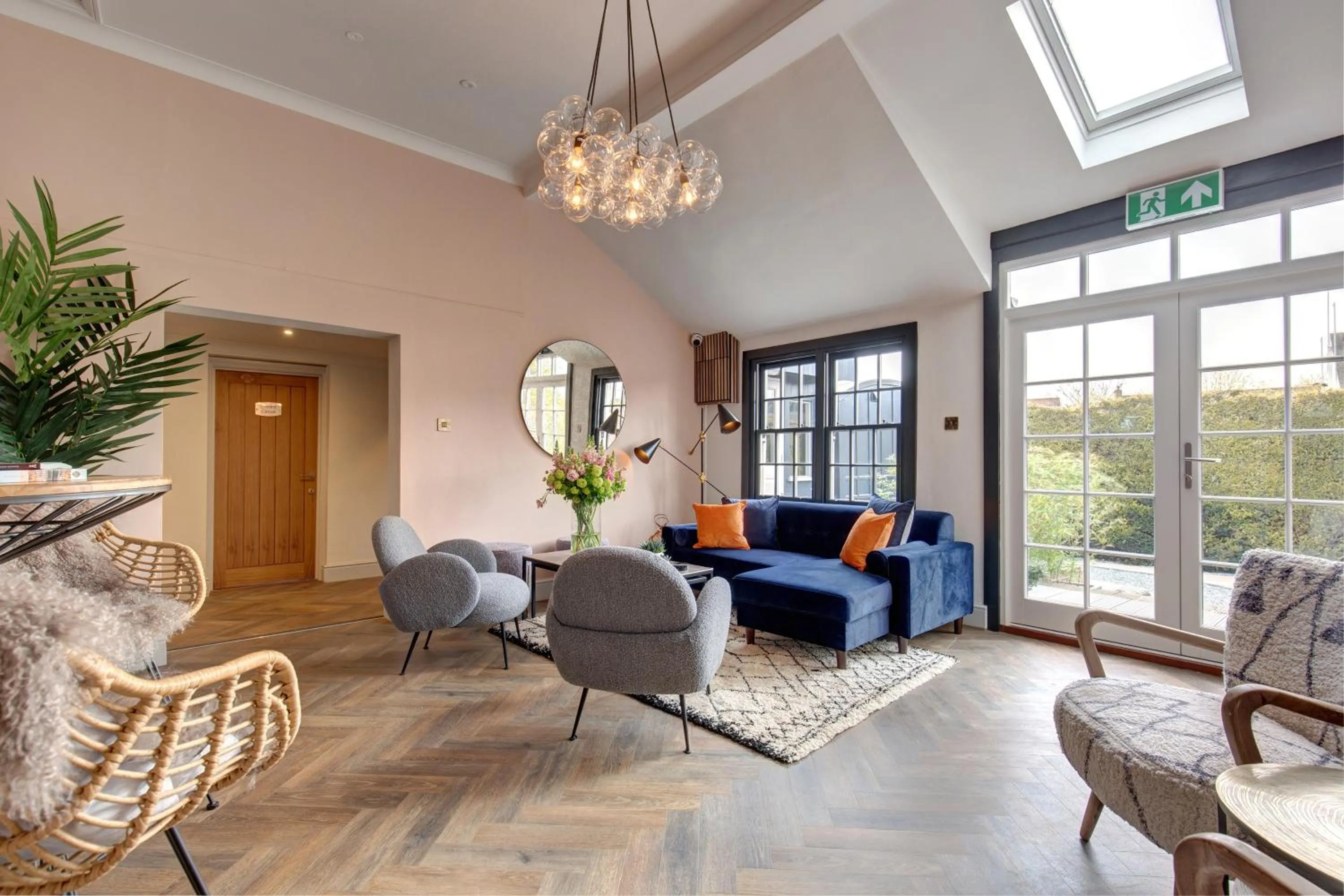 Communal lounge/ TV room in The Railway Hotel by Barefoot Retreats