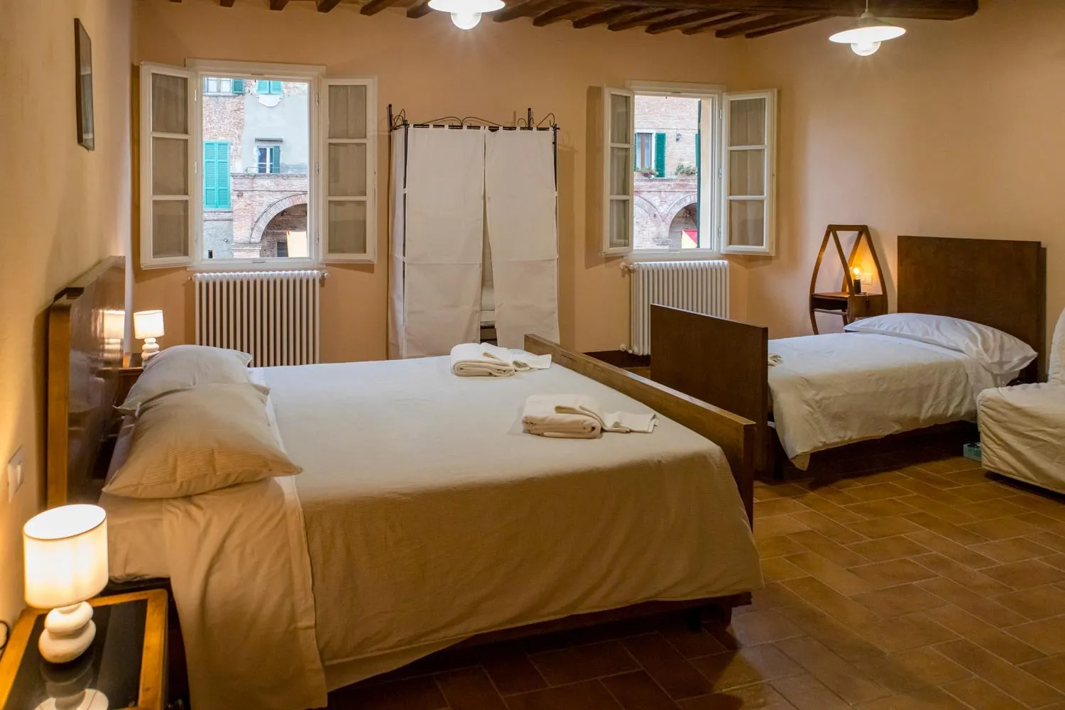 Photo of the whole room, Bed in In Collegiata