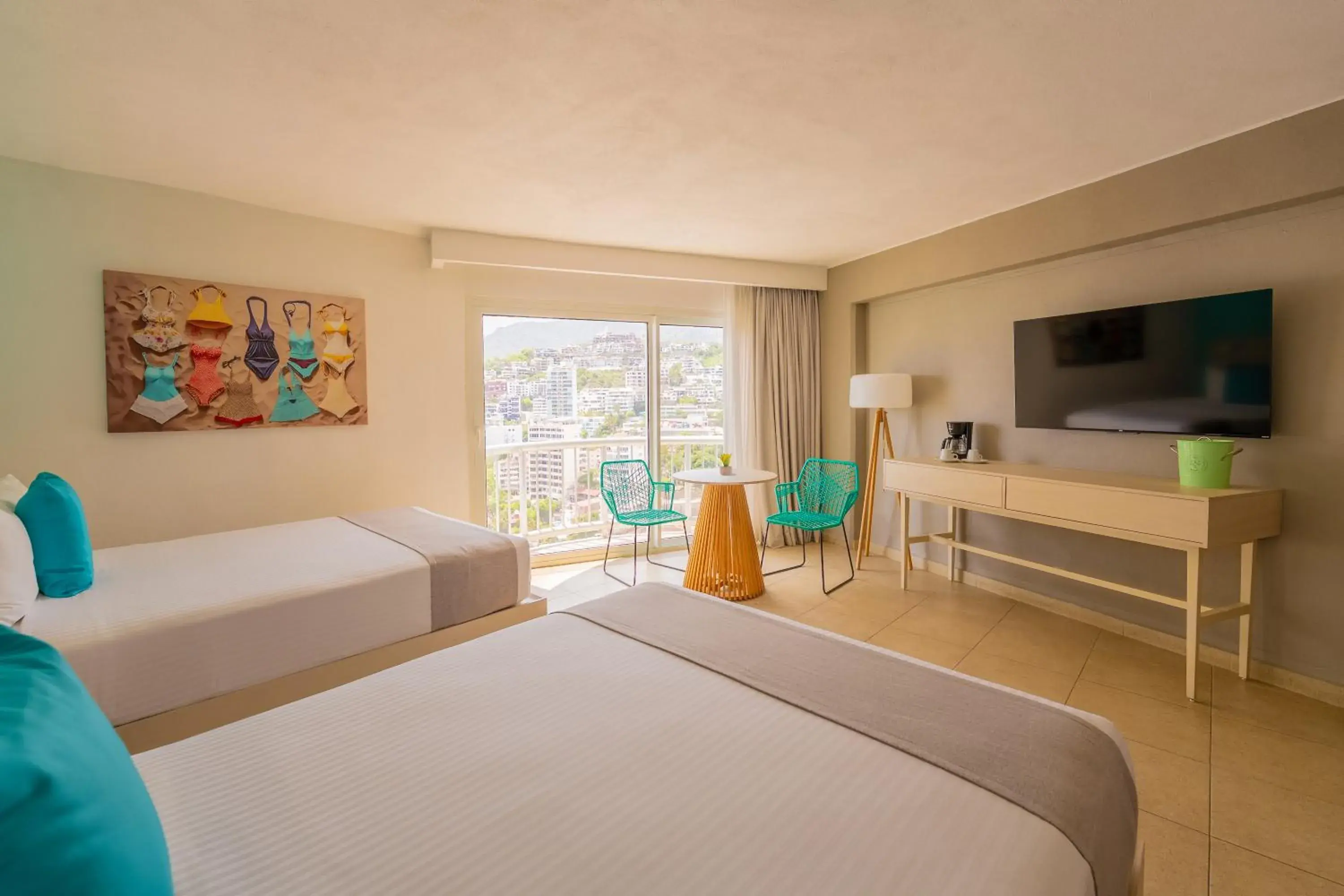 Communal lounge/ TV room, Bed in Hotel Amares Acapulco Communal lounge/ TV room, Bed in Hotel Amares Acapulco