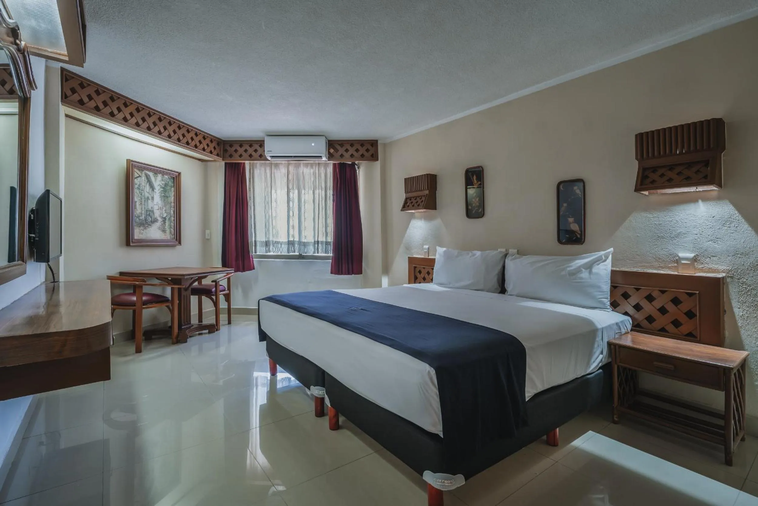 Bed in Hotel Plaza Kokai Cancún