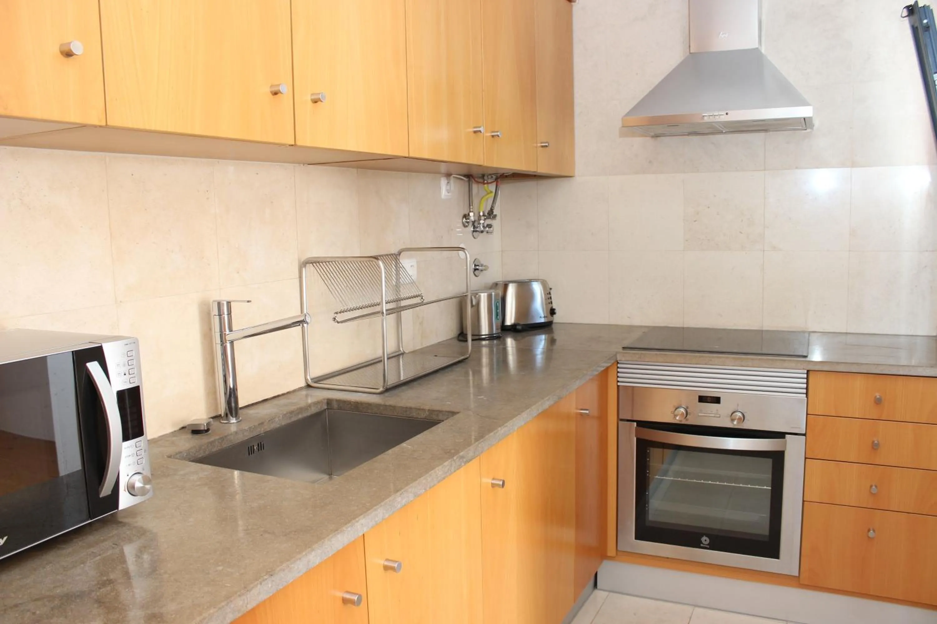Kitchen or kitchenette in Born To Stay In Milfontes