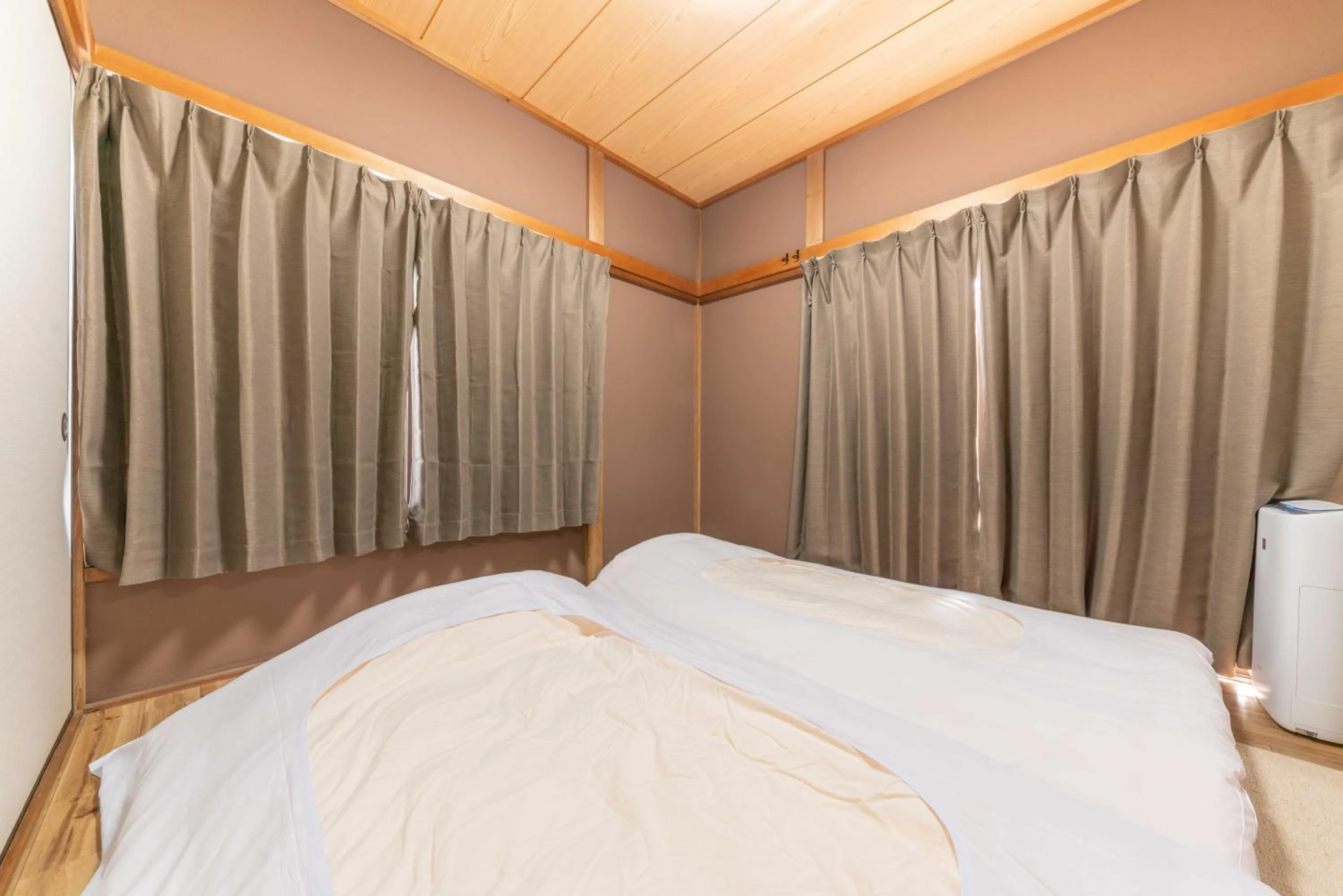 Bed in 箱根湯本 川風荘 - Hakone Yumoto Kawakazesou