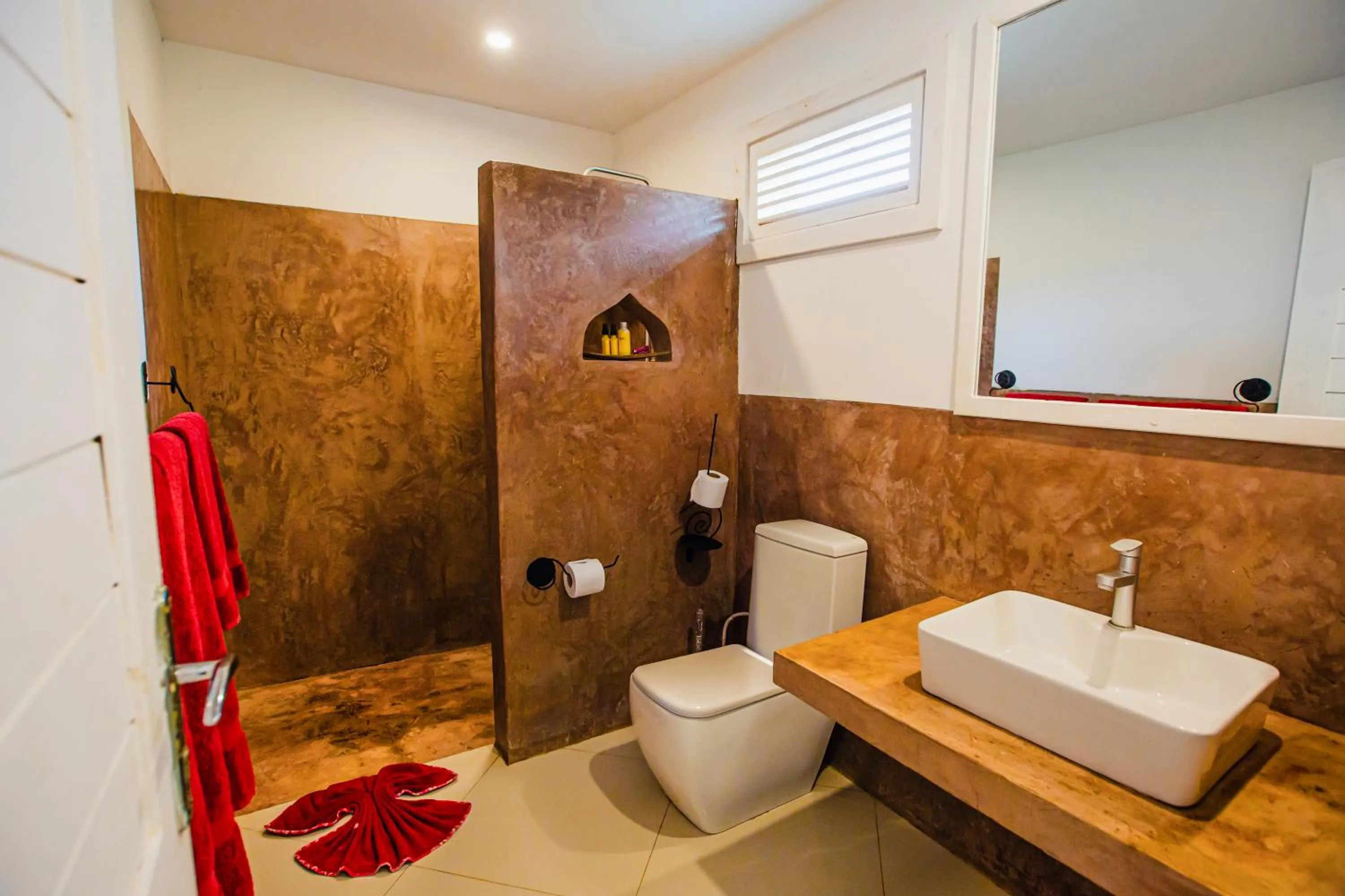 Bathroom in AHG Sun Bay Mlilile Beach Hotel