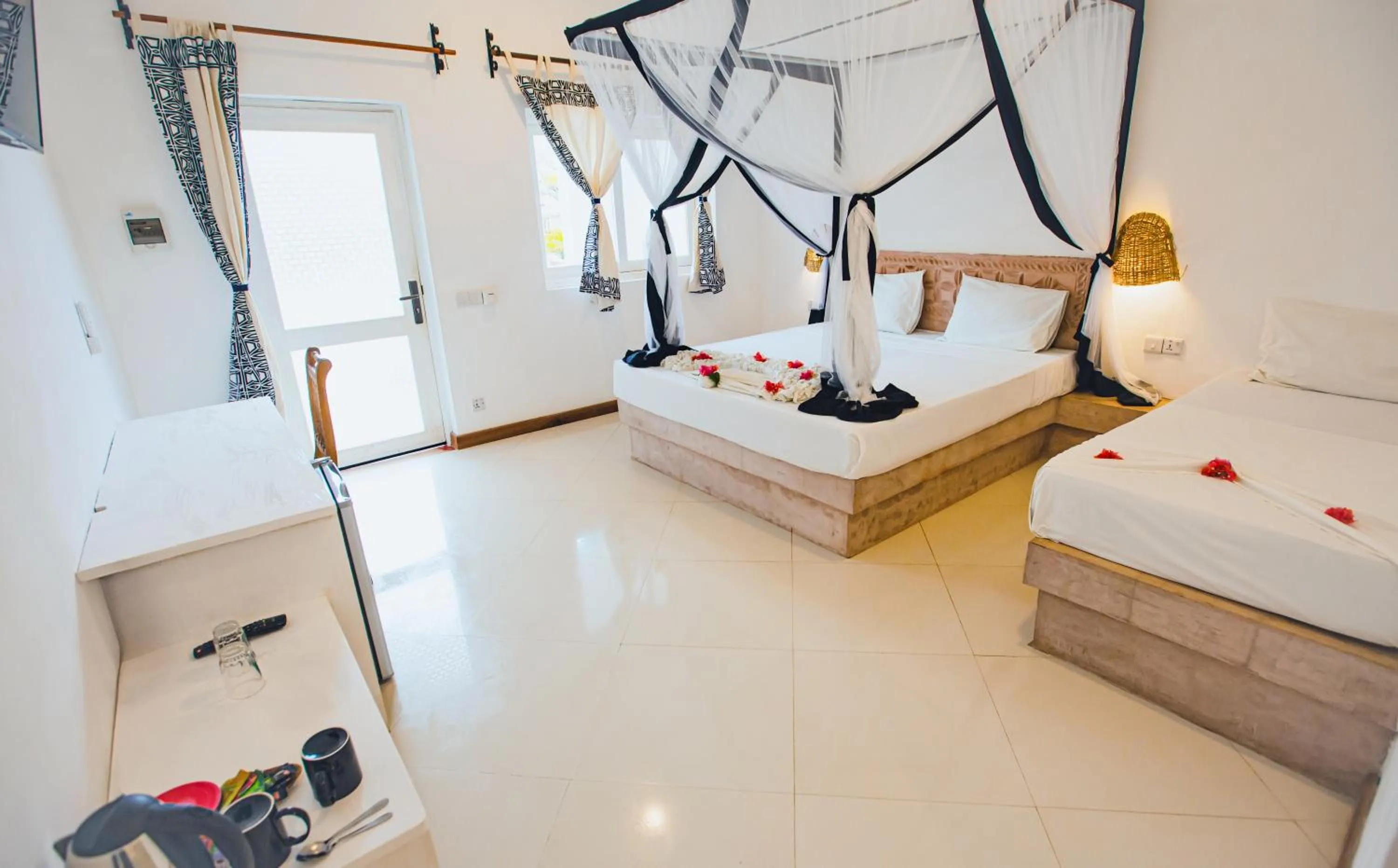 Bed in AHG Sun Bay Mlilile Beach Hotel