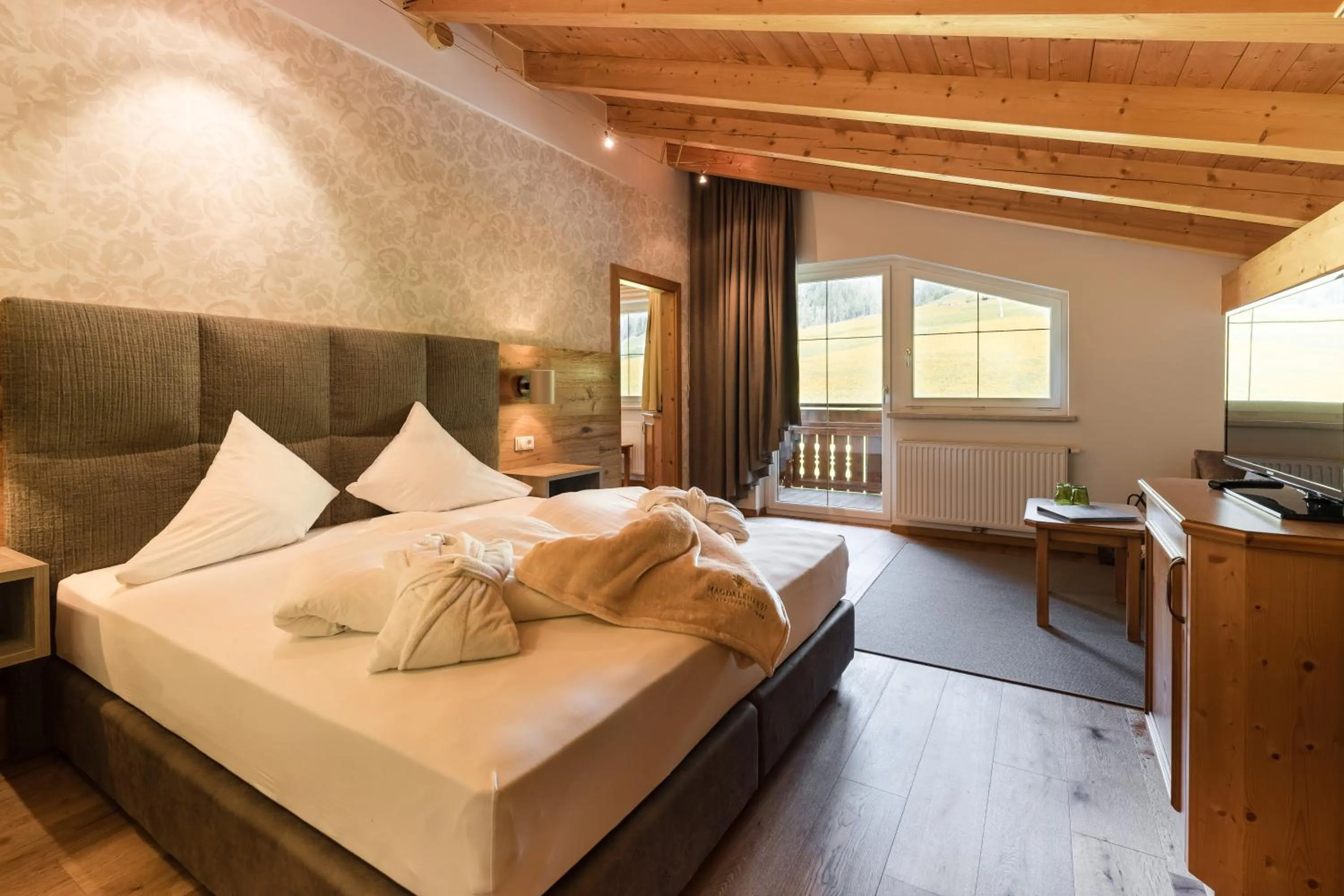 Bedroom, Bed in Vitalpina Hotel Magdalenahof