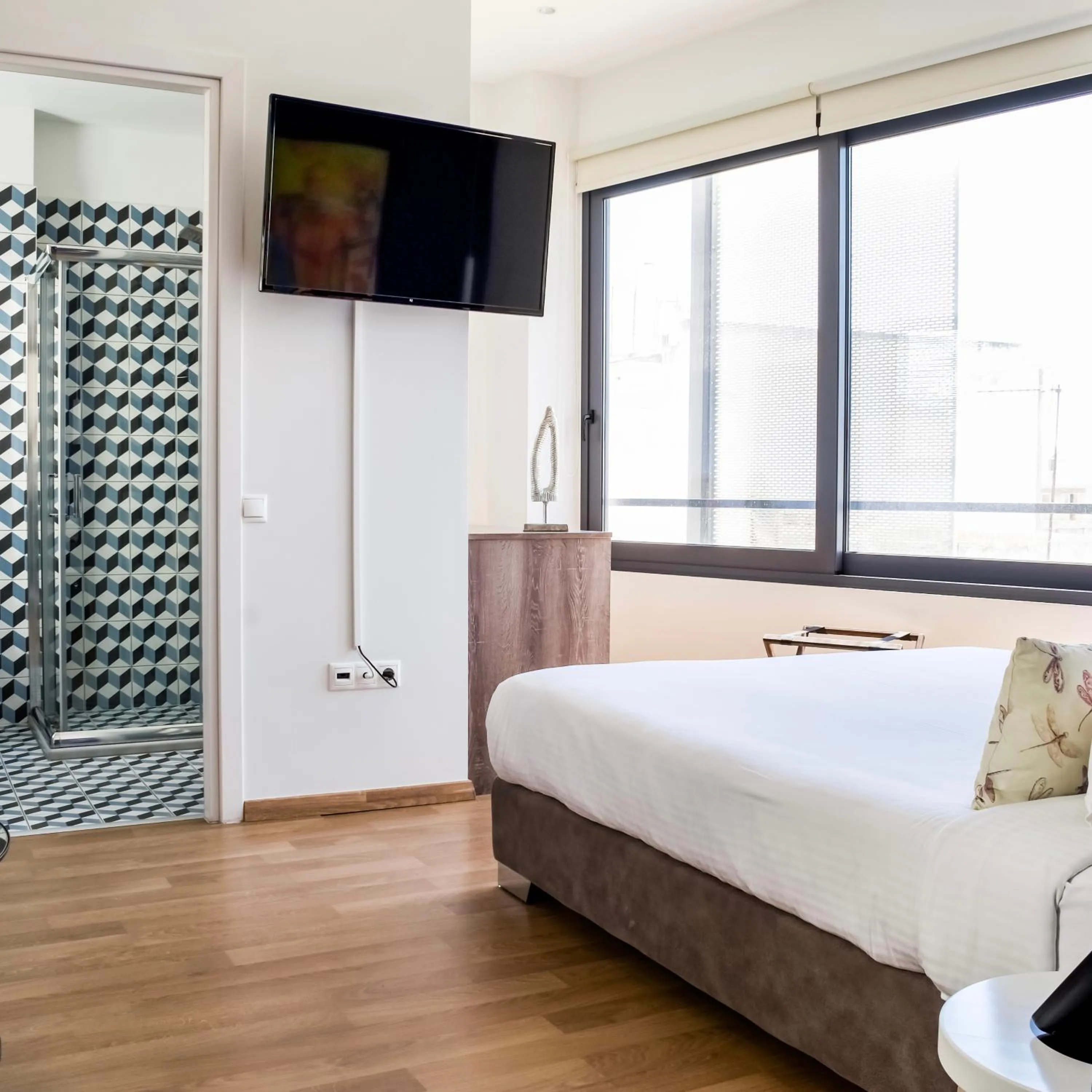 Bed in Iasonos Suites Athens