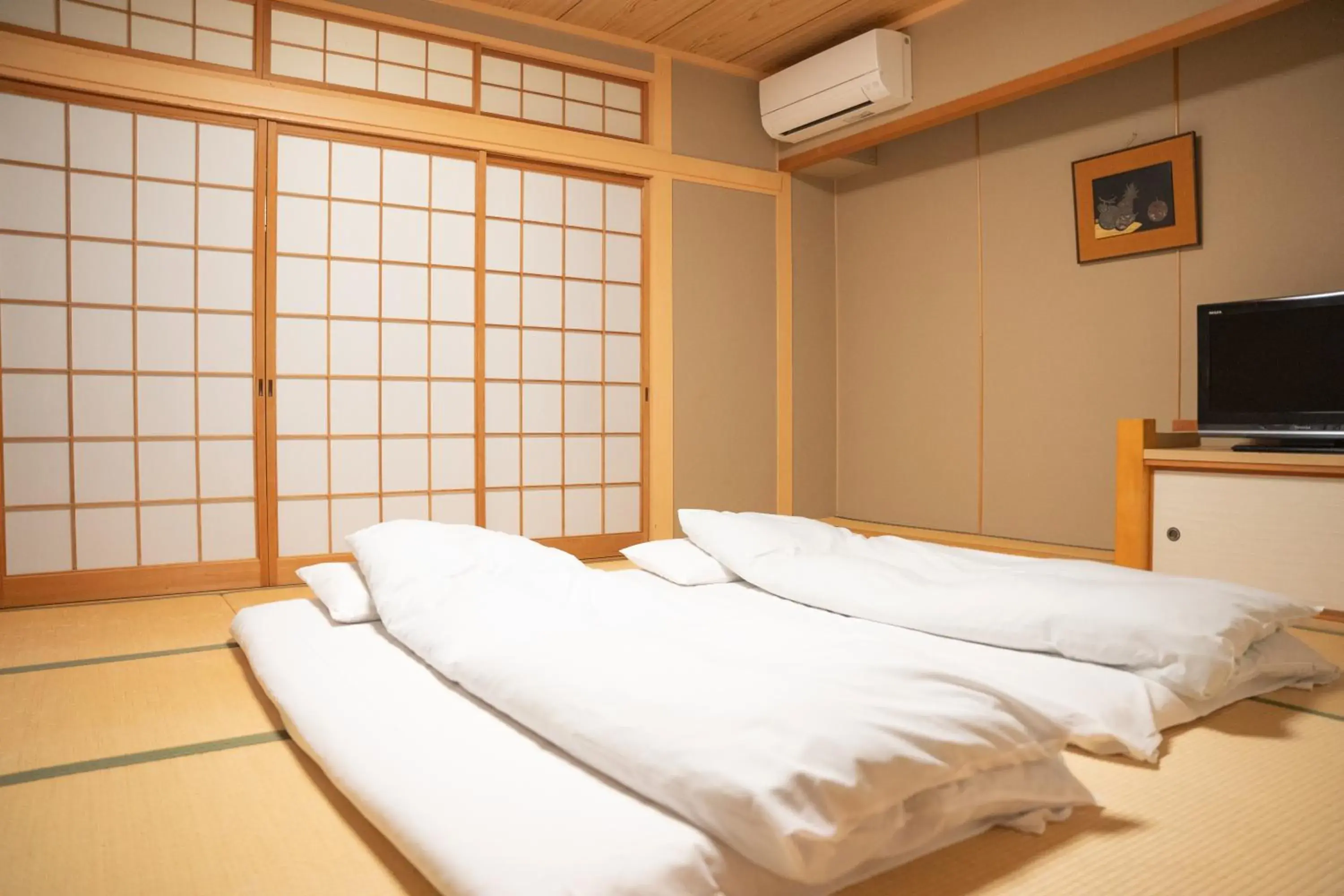 Bedroom, Bed in Yumoto Kanko Hotel Saikyo Bedroom, Bed in Yumoto Kanko Hotel Saikyo