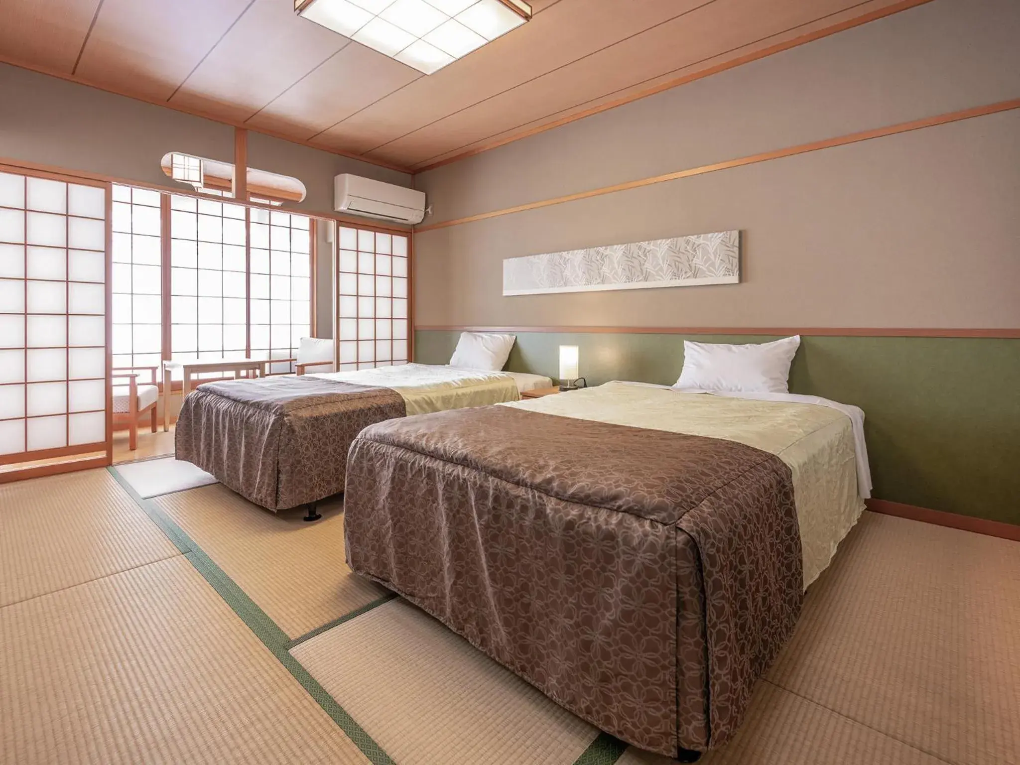 Photo of the whole room, Bed in Yumoto Kanko Hotel Saikyo Photo of the whole room, Bed in Yumoto Kanko Hotel Saikyo