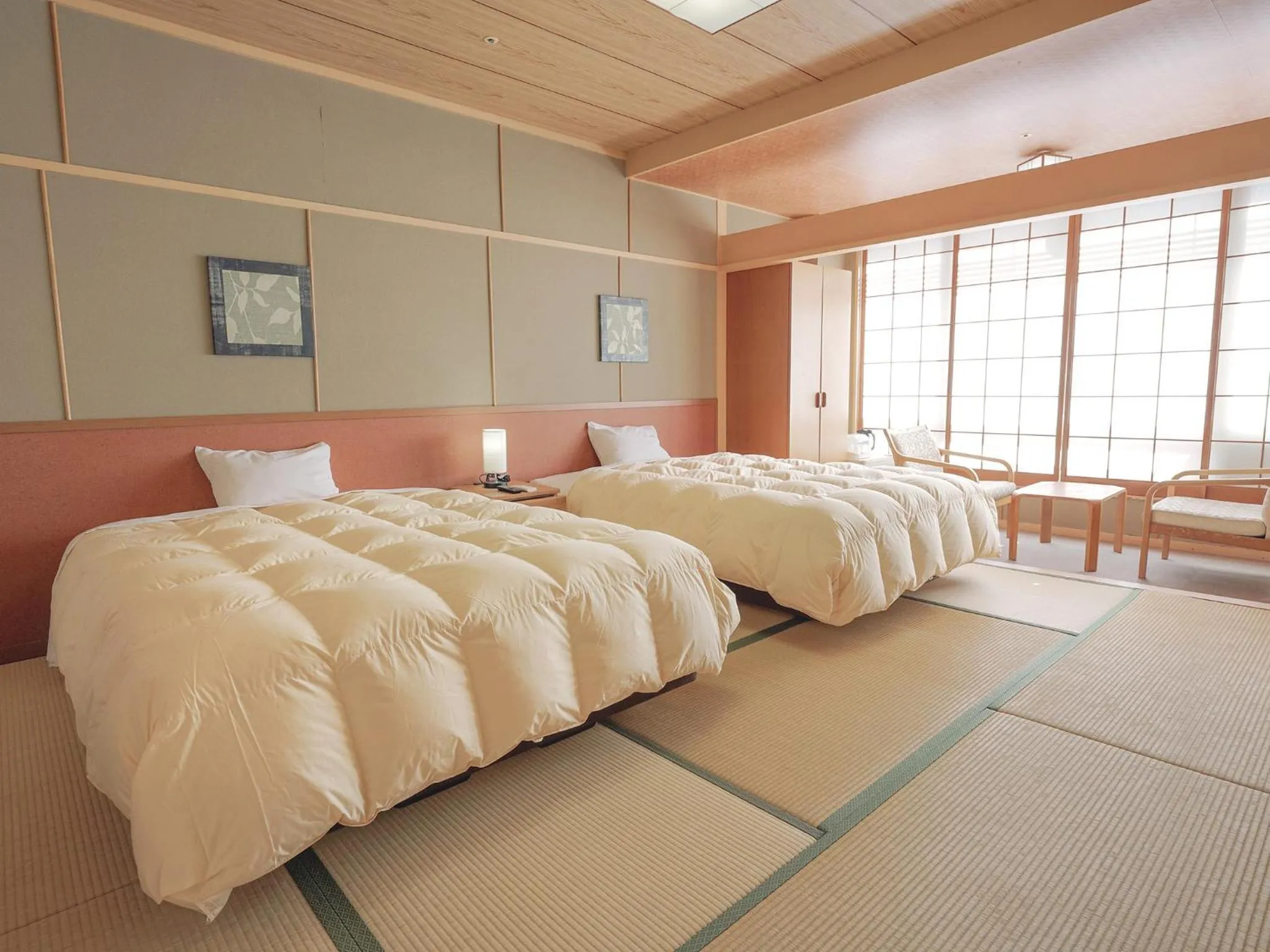 Bed in Yumoto Kanko Hotel Saikyo