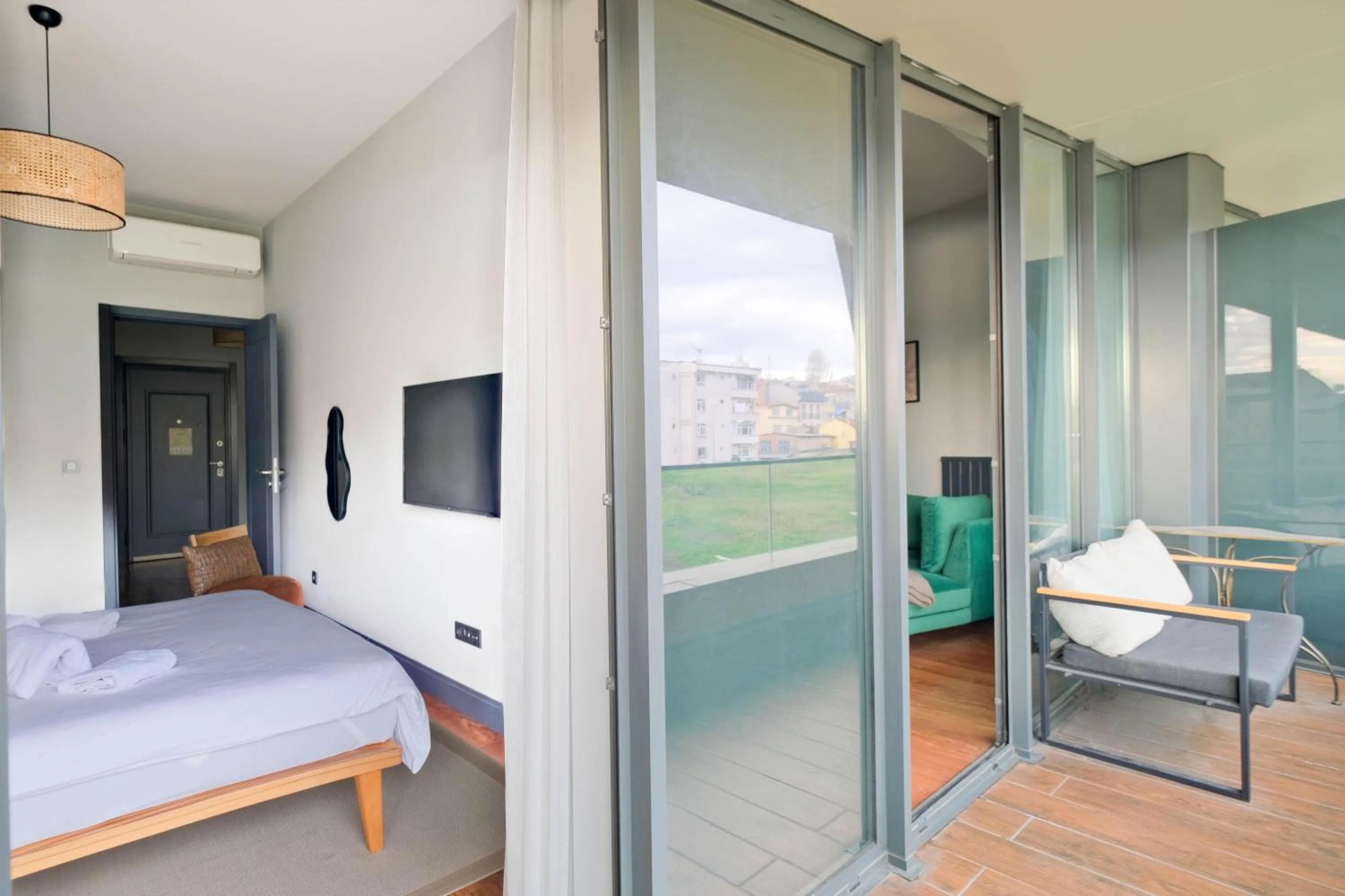 Balcony/Terrace, Bed in Benesta Residence by NewInn