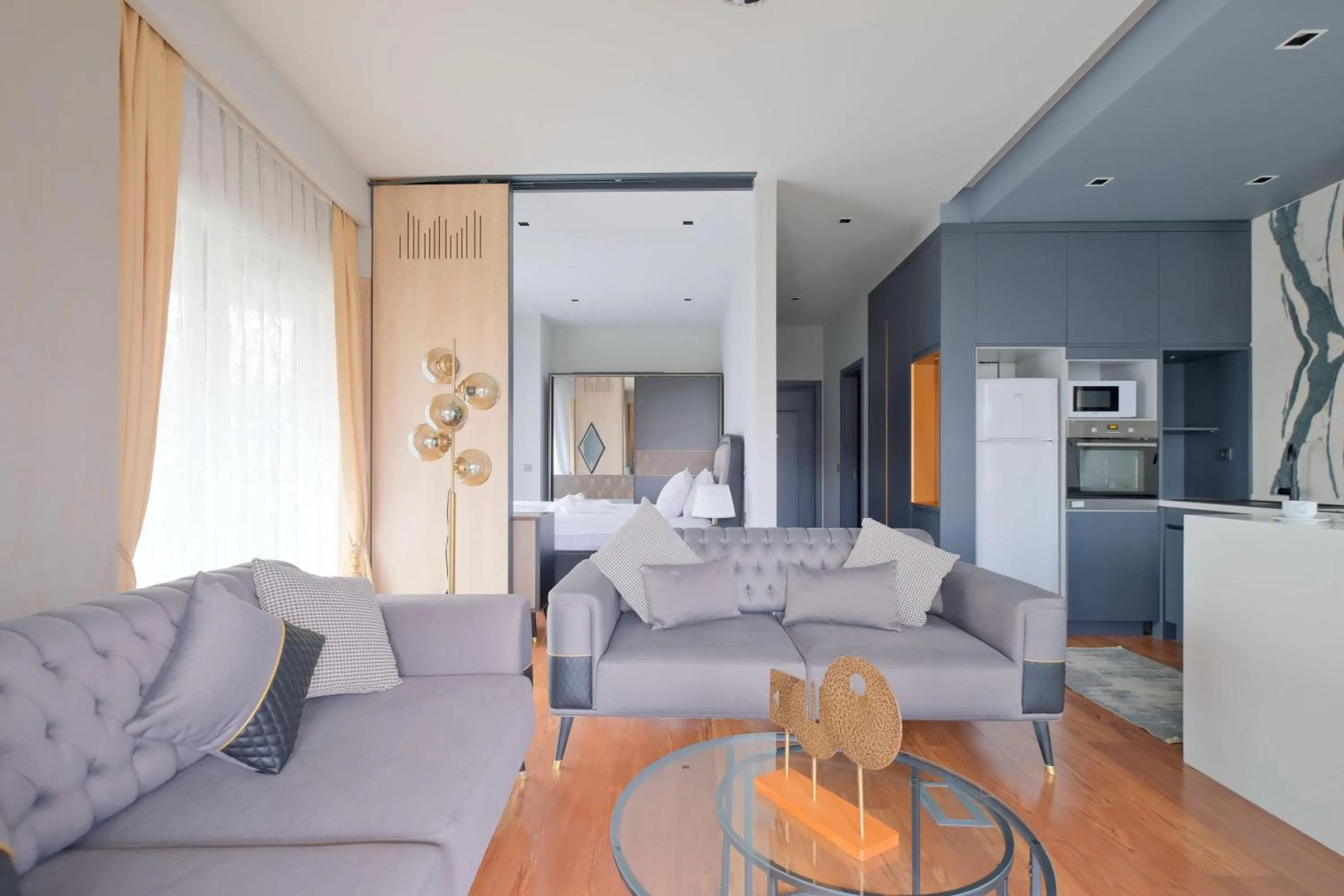 Living room in Benesta Residence by NewInn