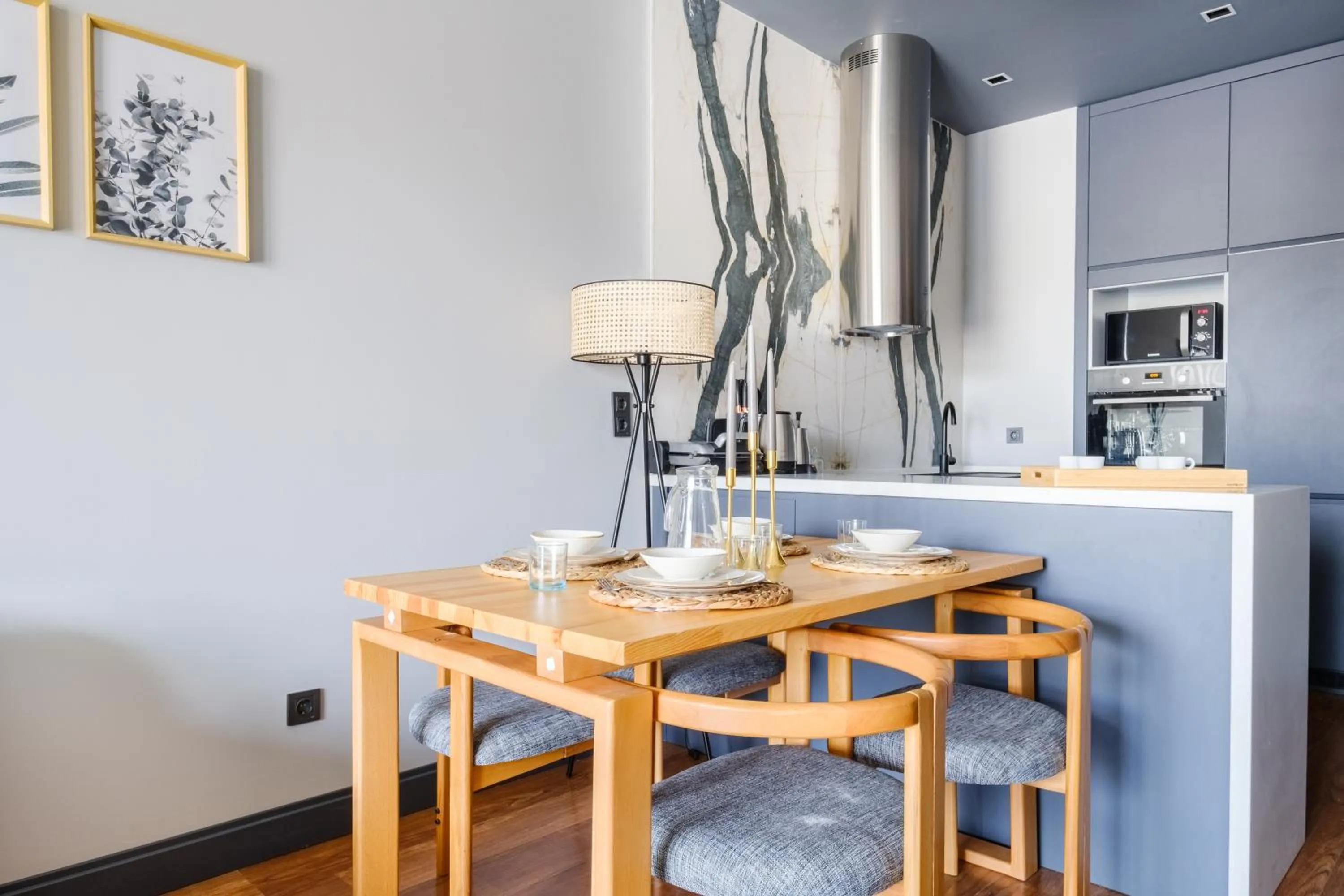 Dining area in Benesta Residence by NewInn