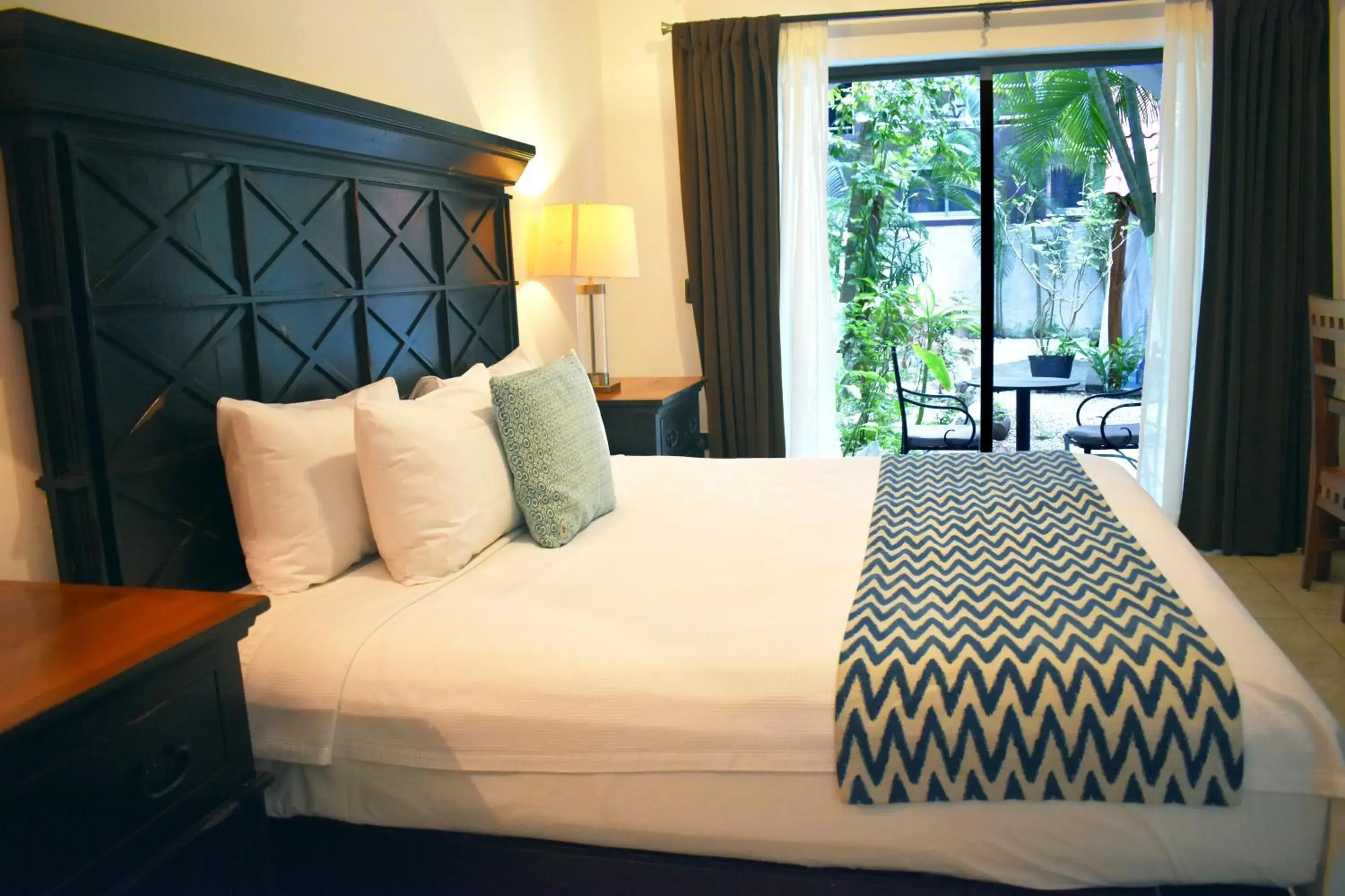 Bed in Hacienda Paradise Hotel Bed in Hacienda Paradise Hotel