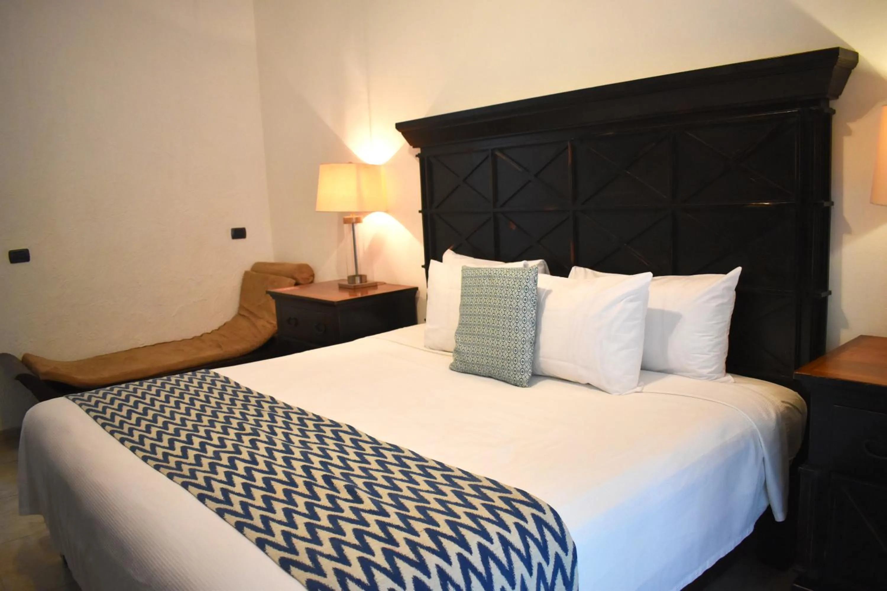 Bed in Hacienda Paradise Hotel