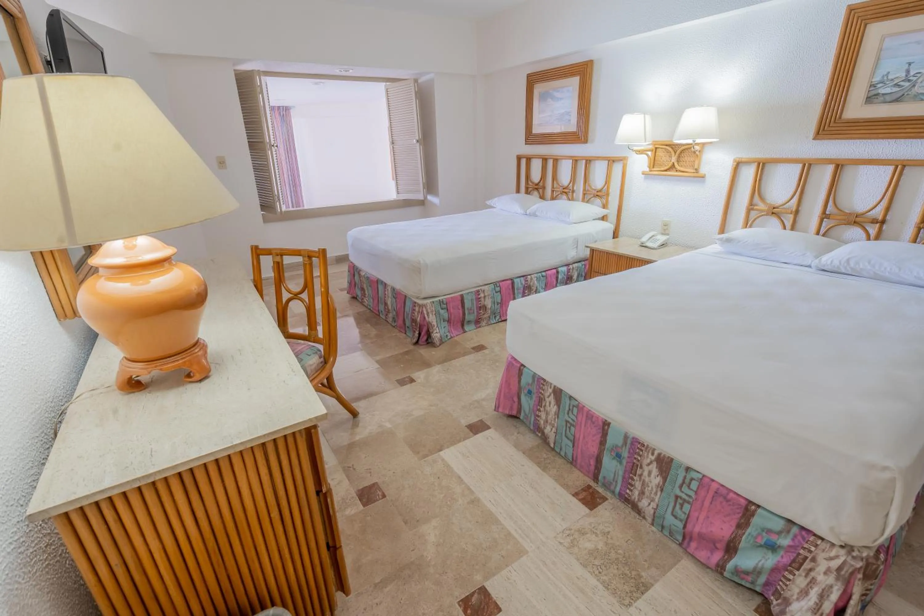 Bed in Playa Suites Acapulco