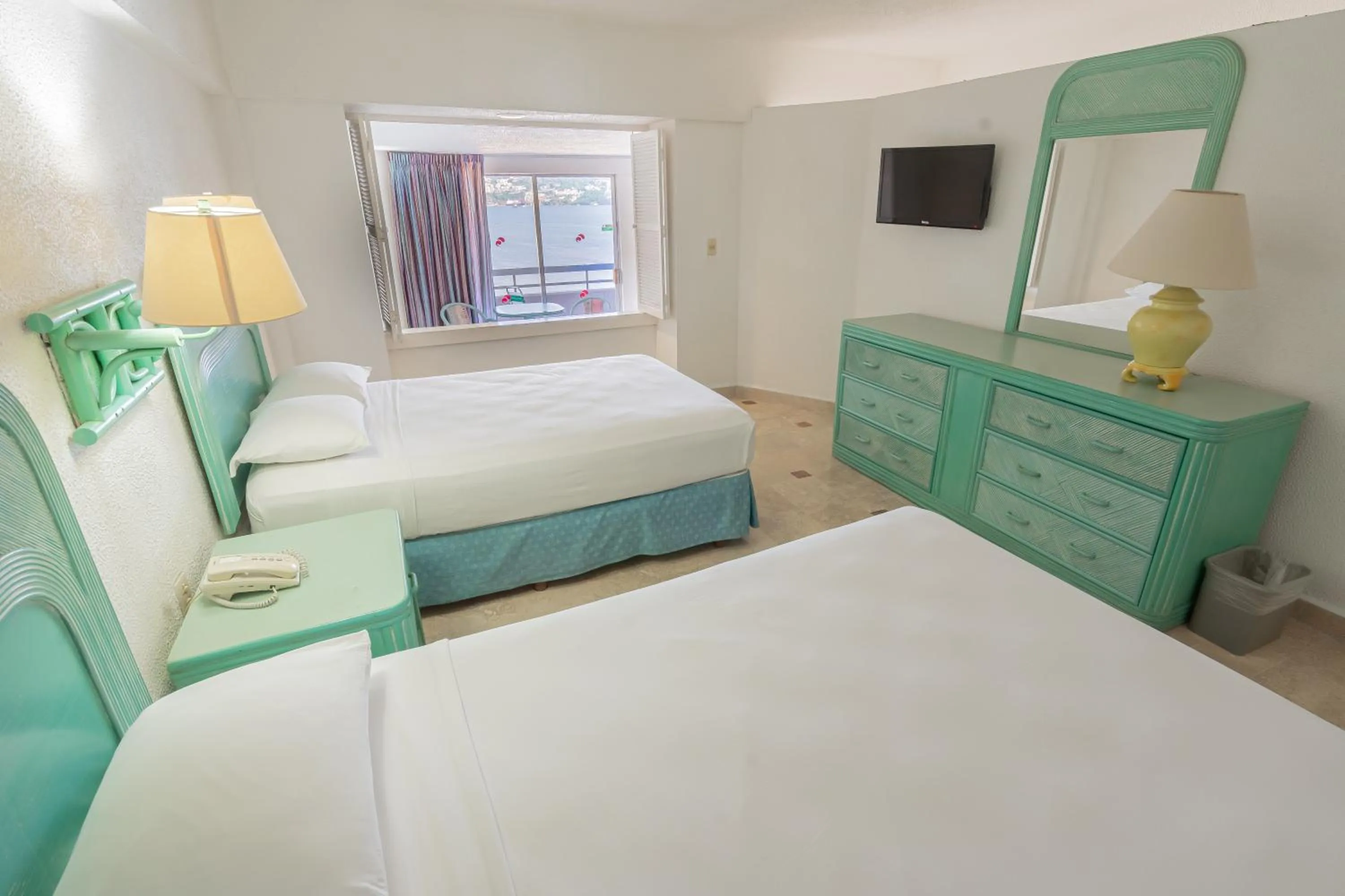 Bed in Playa Suites Acapulco