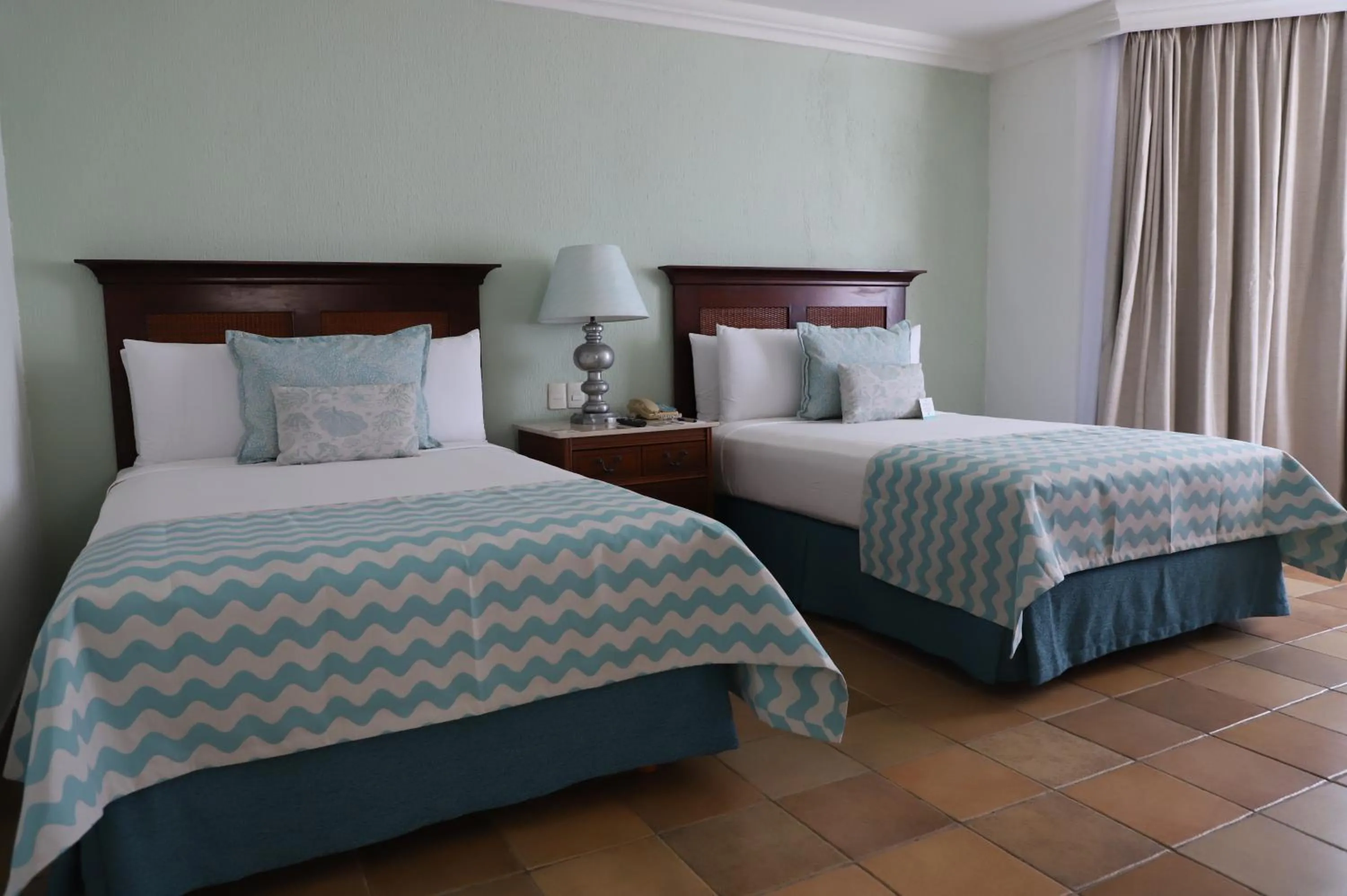 Bed in Pierre Mundo Imperial Riviera Diamante Acapulco