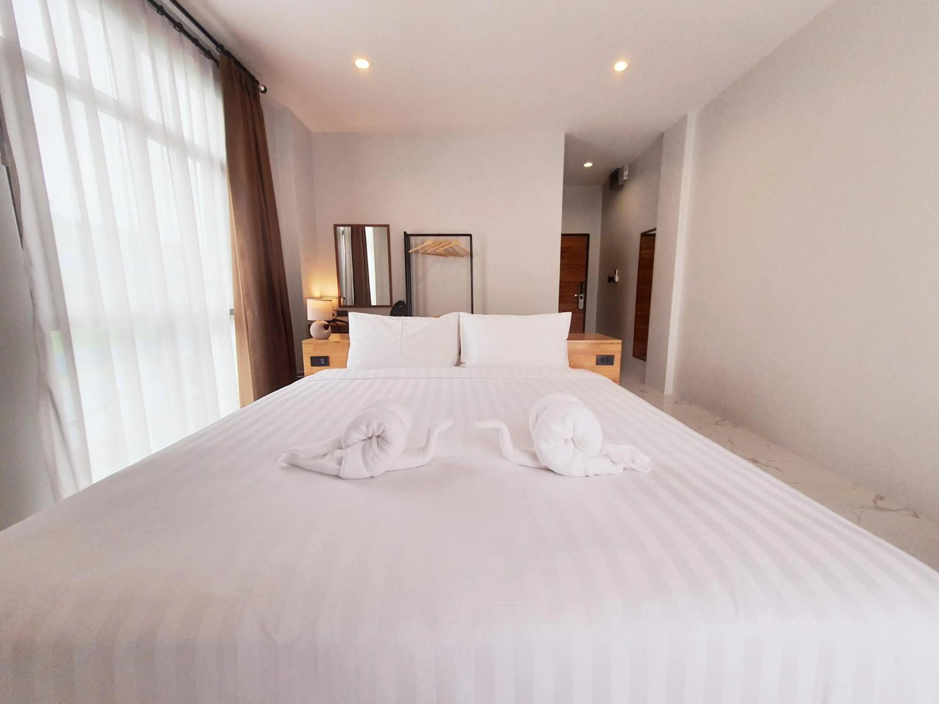 Bed in SUhotel Suratthani