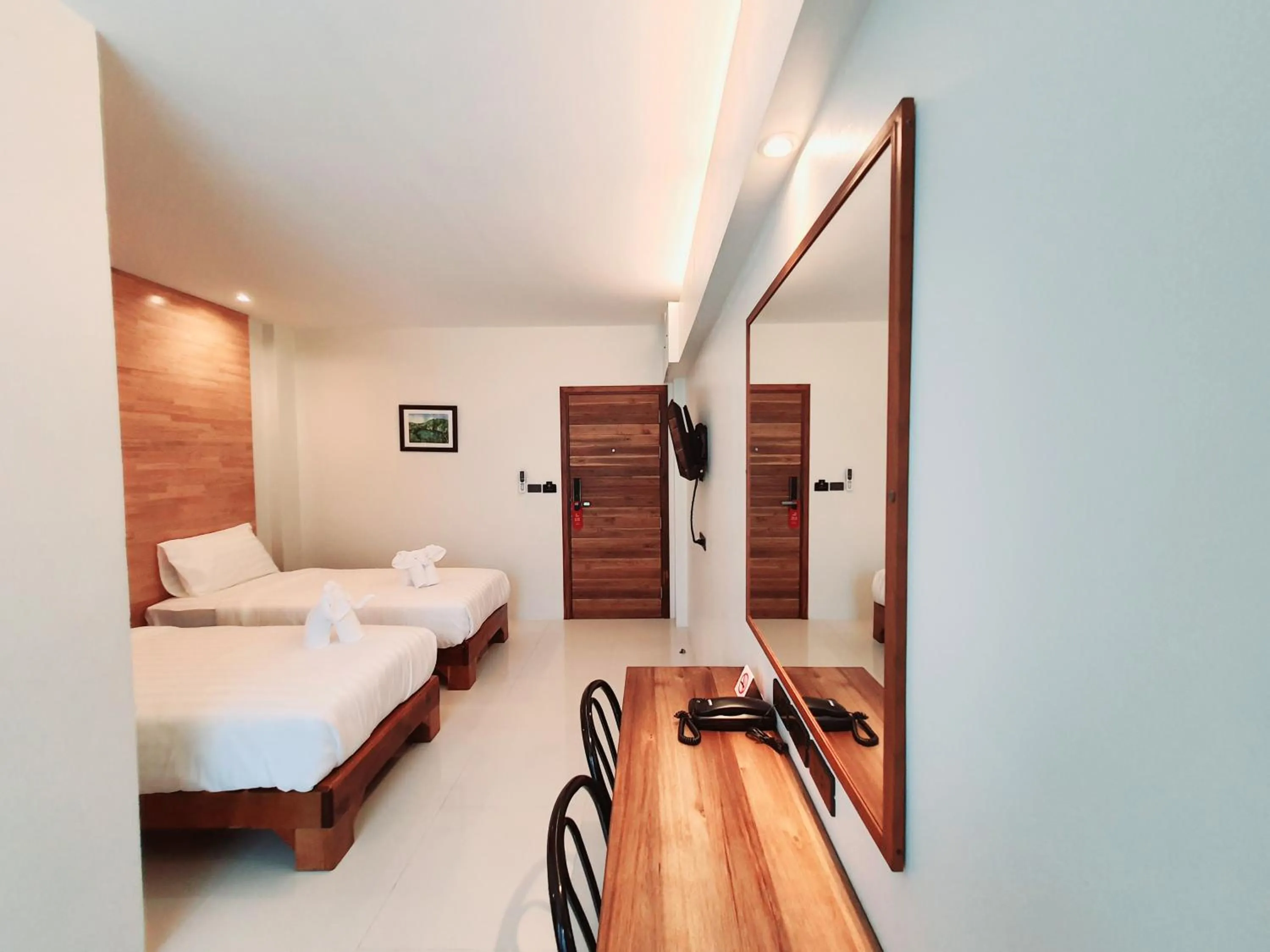 Photo of the whole room, Bed in SUhotel Suratthani