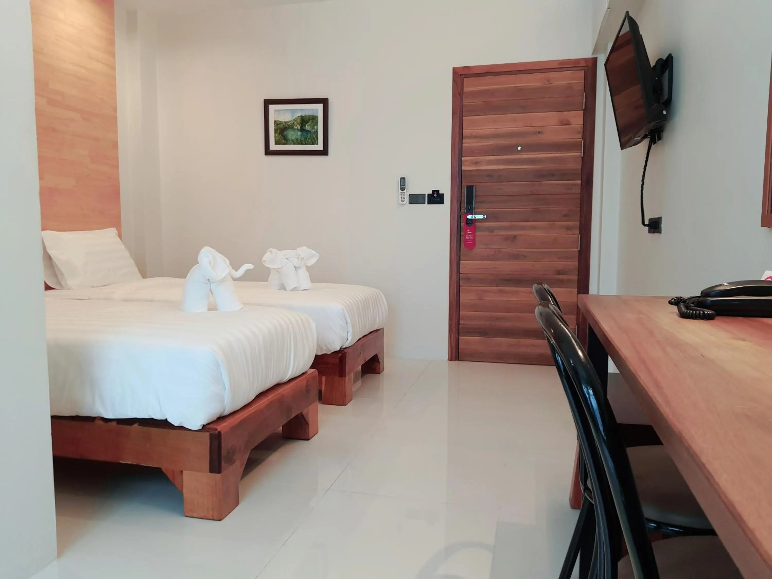 Photo of the whole room, Bed in SUhotel Suratthani
