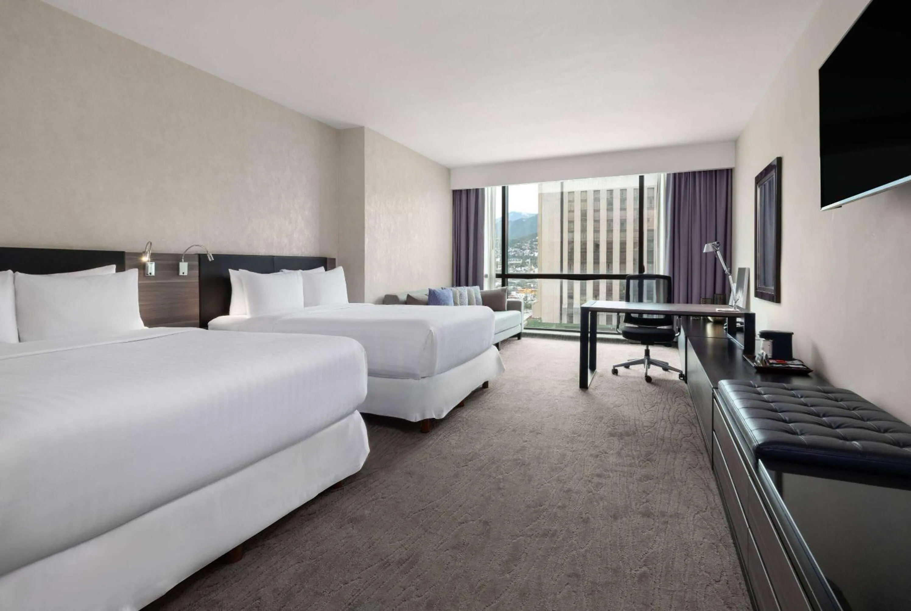 Photo of the whole room, Bed in Wyndham Monterrey Ambassador Centro