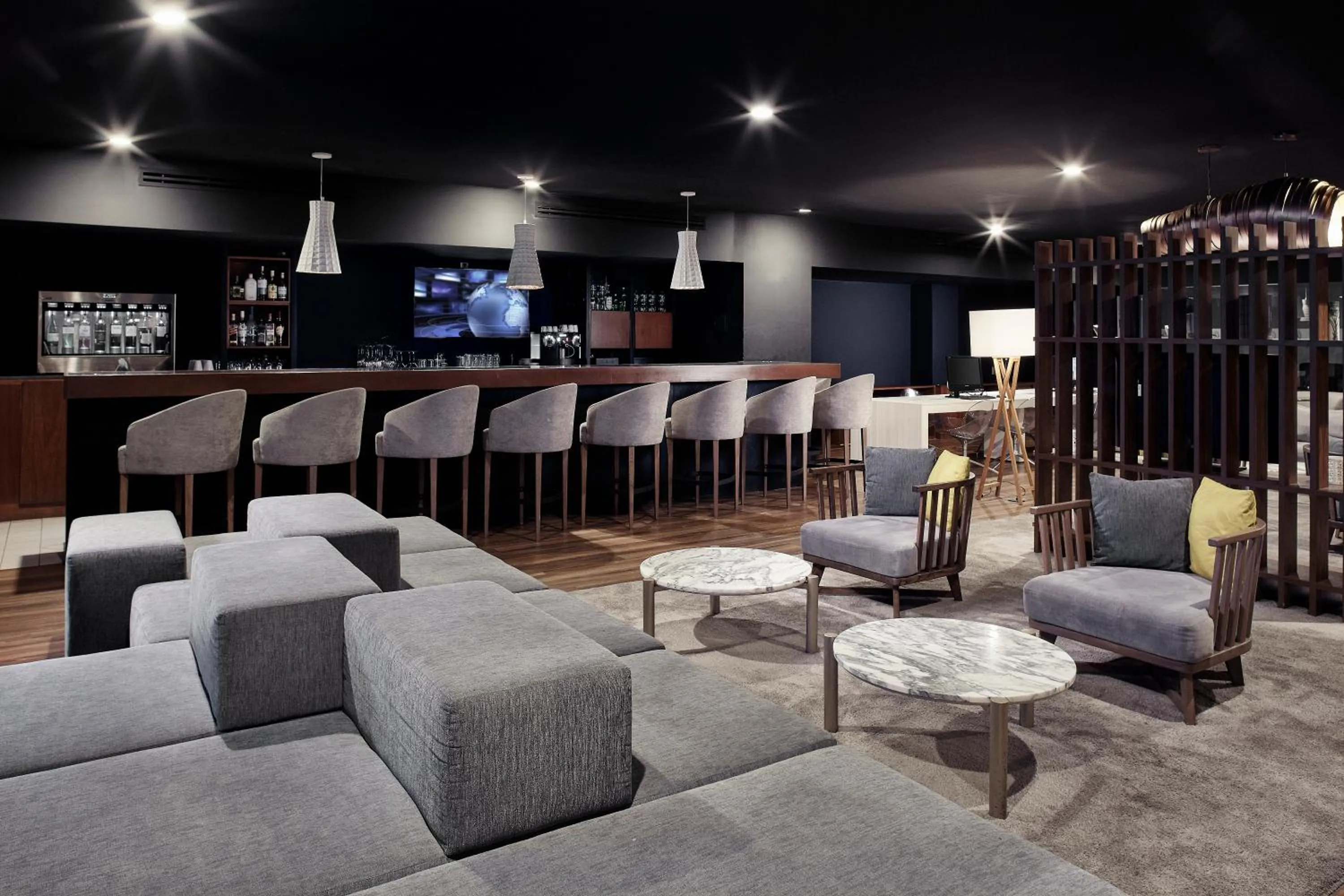 Communal lounge/ TV room in Wyndham Monterrey Ambassador Centro