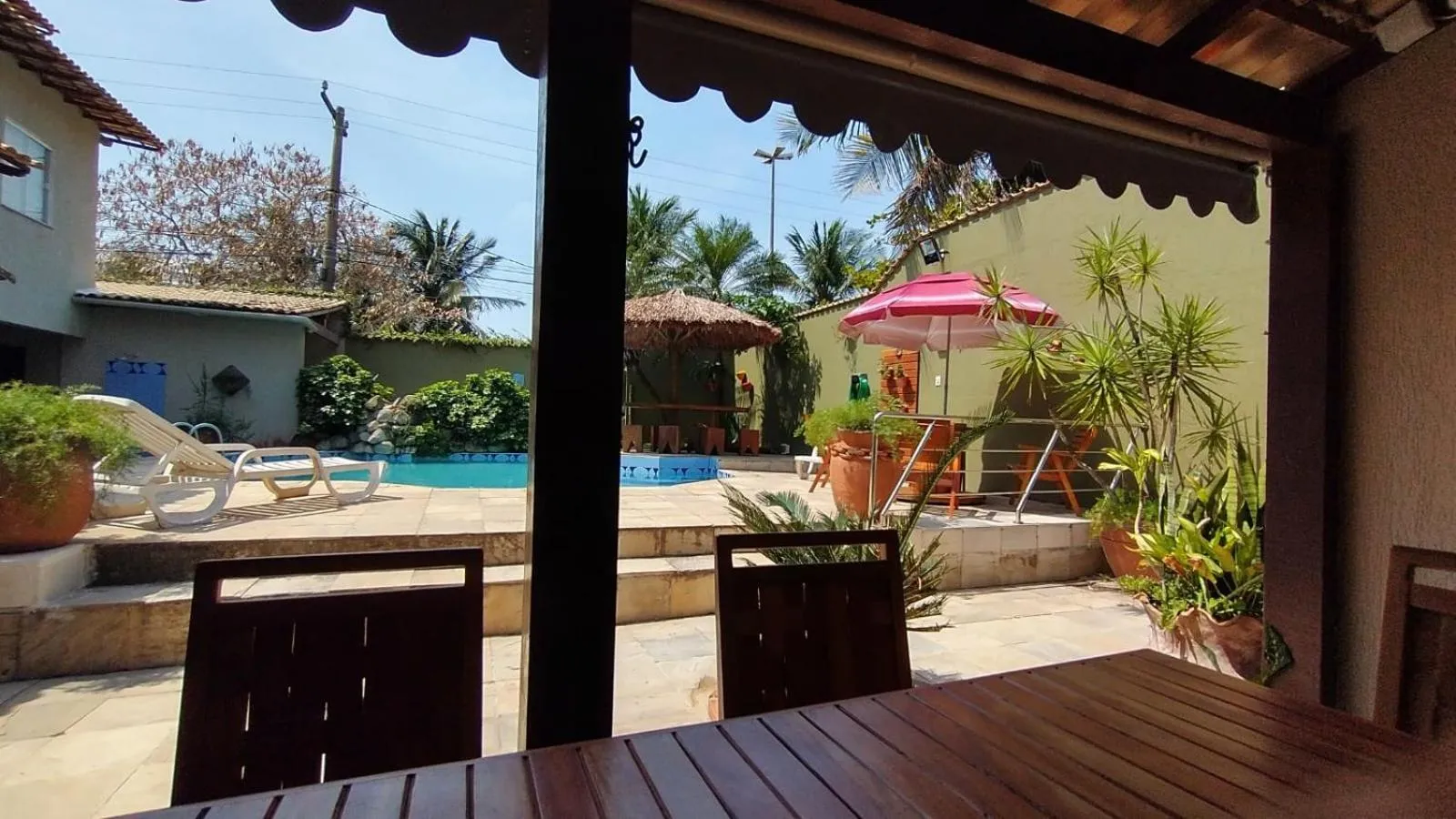 Swimming pool in POUSADA CASA DIAMANTe