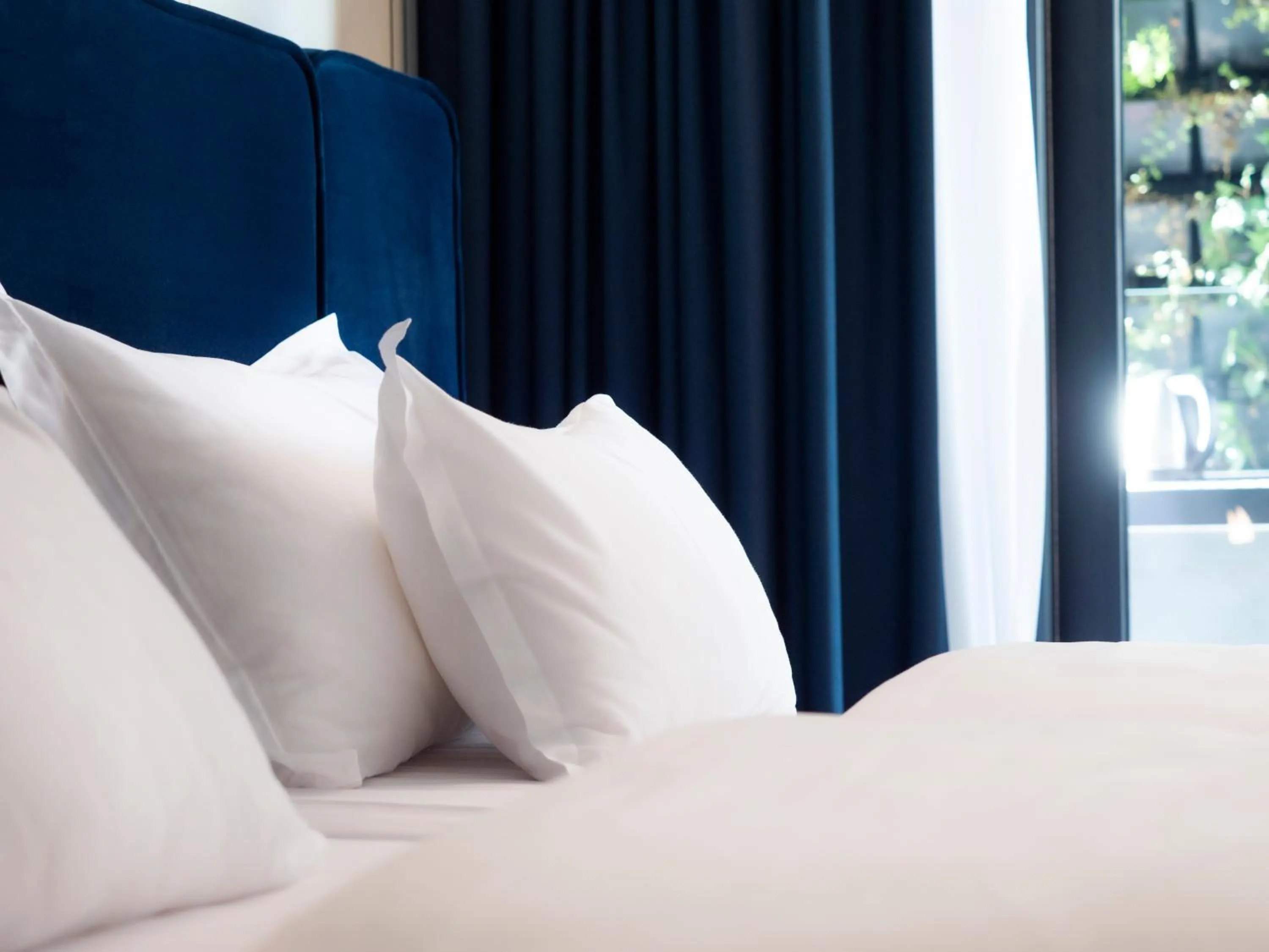 Bed in Moncafe Boutique Hotel & SPA Tirana