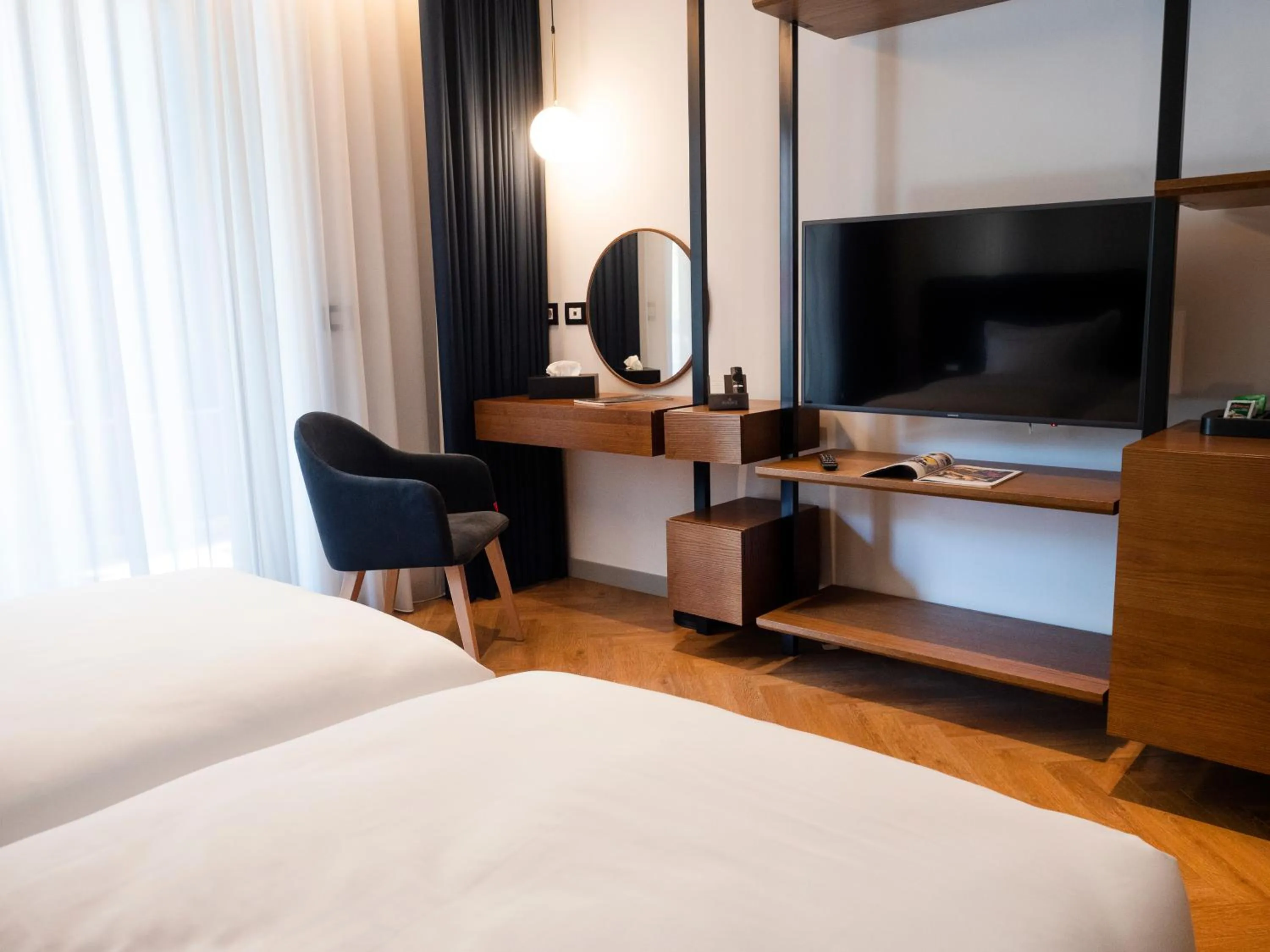 Bed in Moncafe Boutique Hotel & SPA Tirana