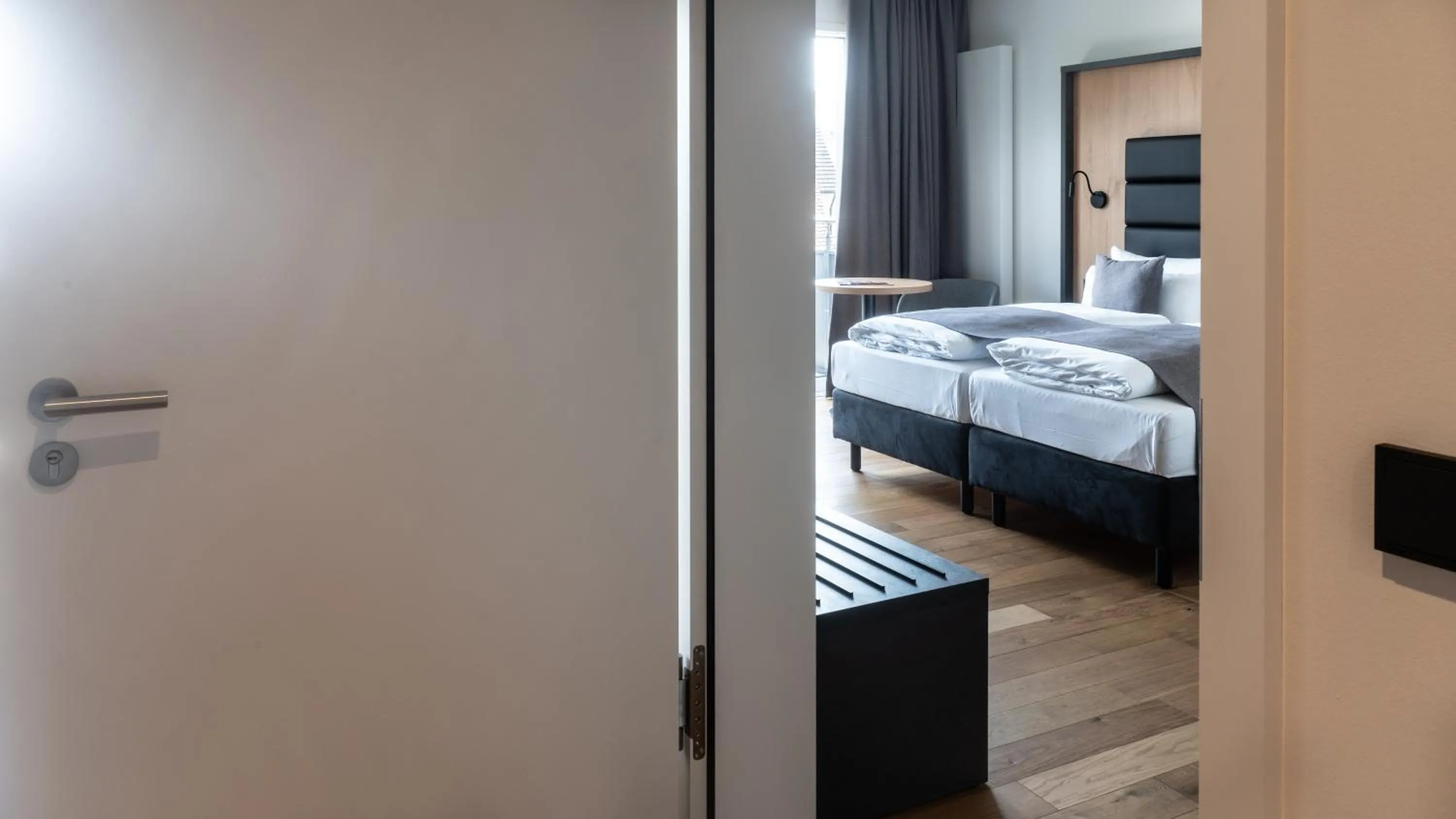 Photo of the whole room, Bed in Burgau Hotel Sonnenhof