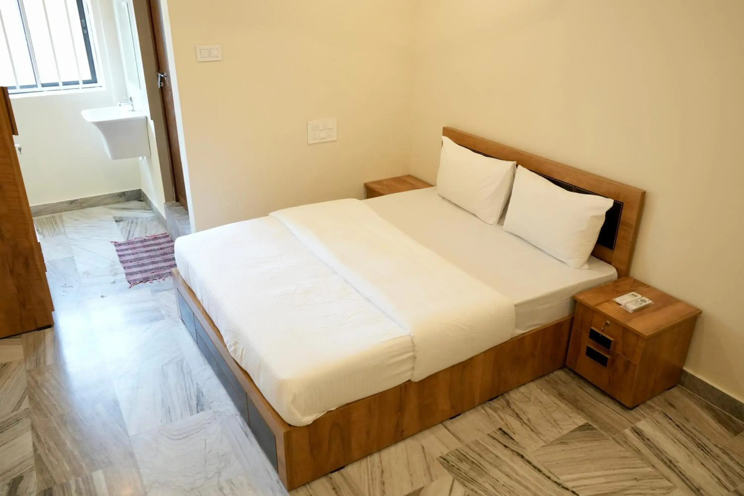 Bedroom in Kalanad Residency And Convention Centre Bedroom in Kalanad Residency And Convention Centre