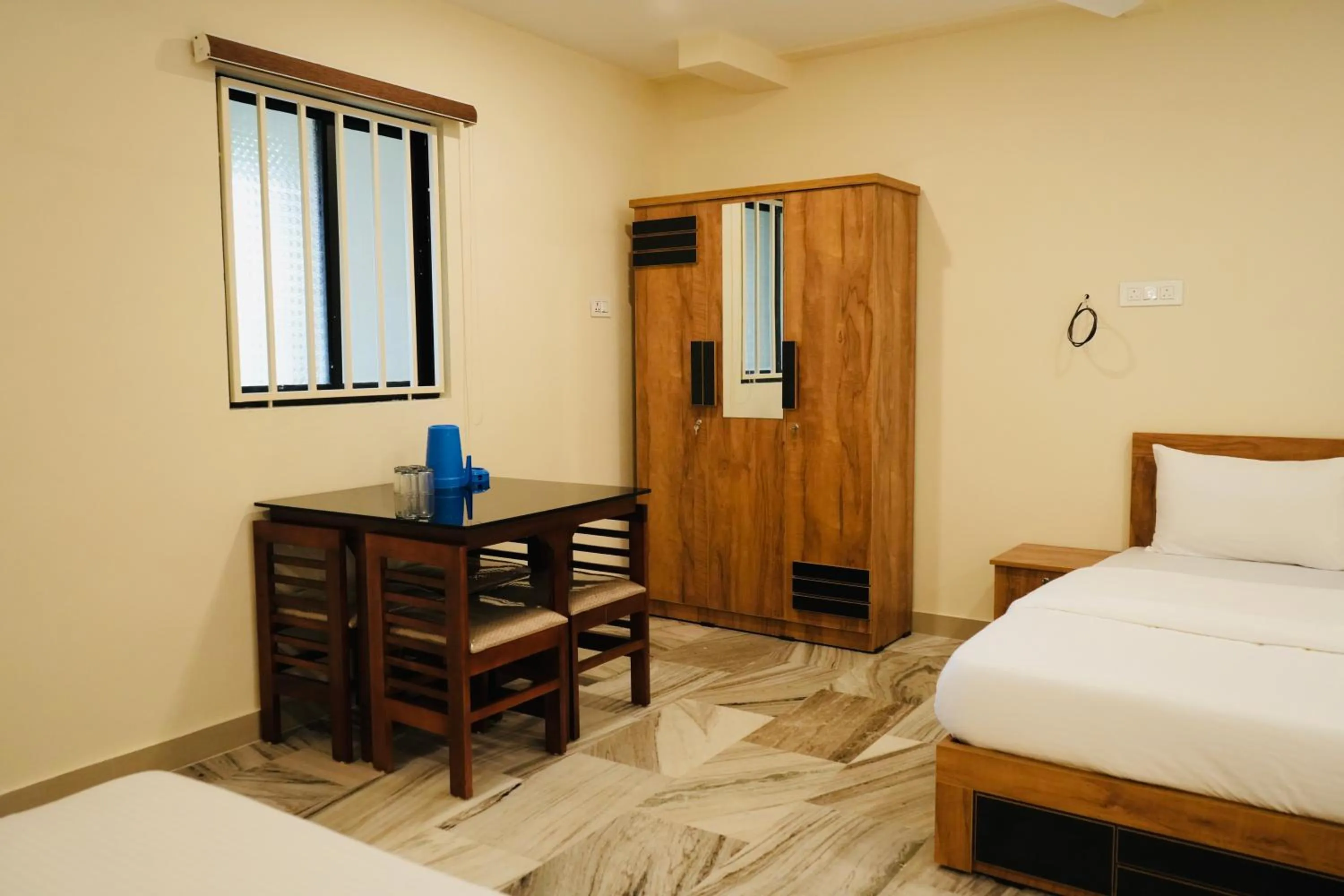 Bed in Kalanad Residency And Convention Centre