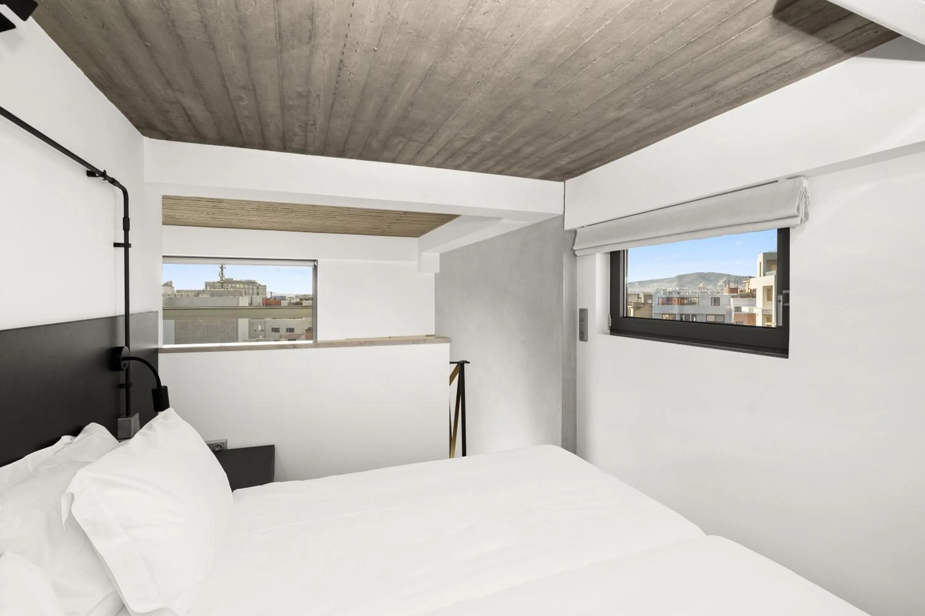 Bed in ATHENIAN VIEW LOFT