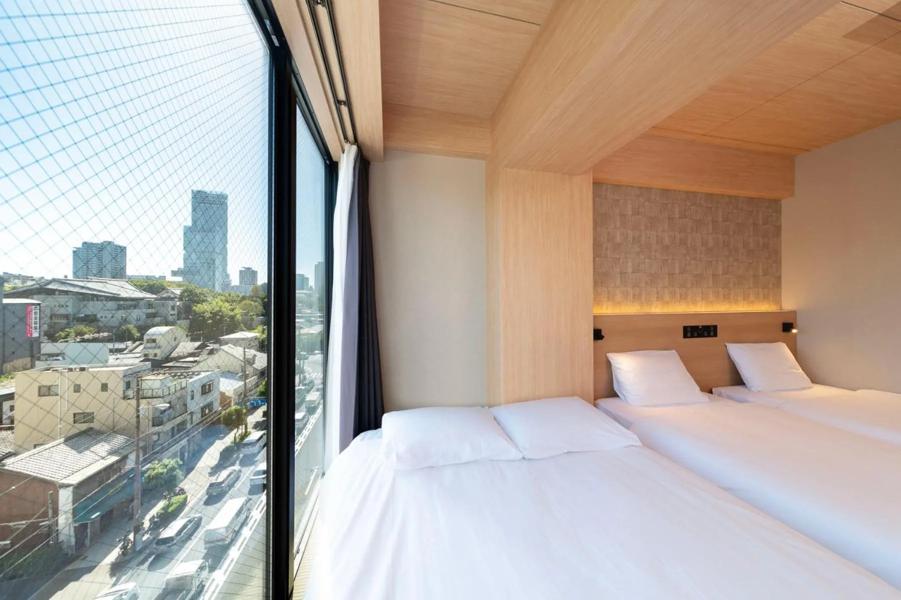 Photo of the whole room, Bed in WELLSTAY Shinsekai Wakyo