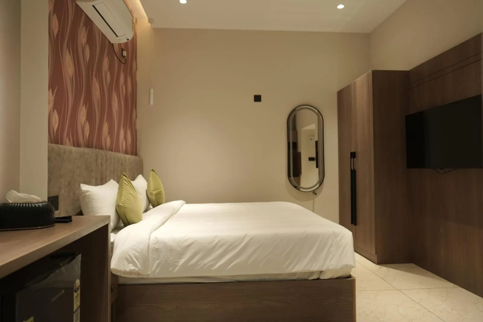 Bed in Muziris Manor Residency