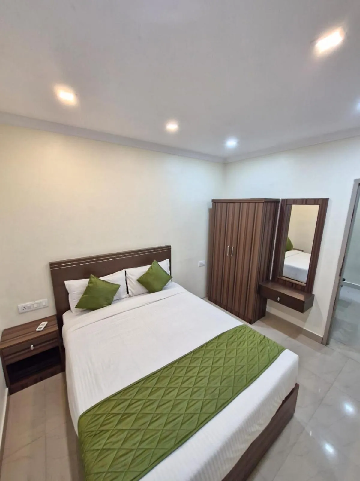 Bed in Muziris Manor Residency