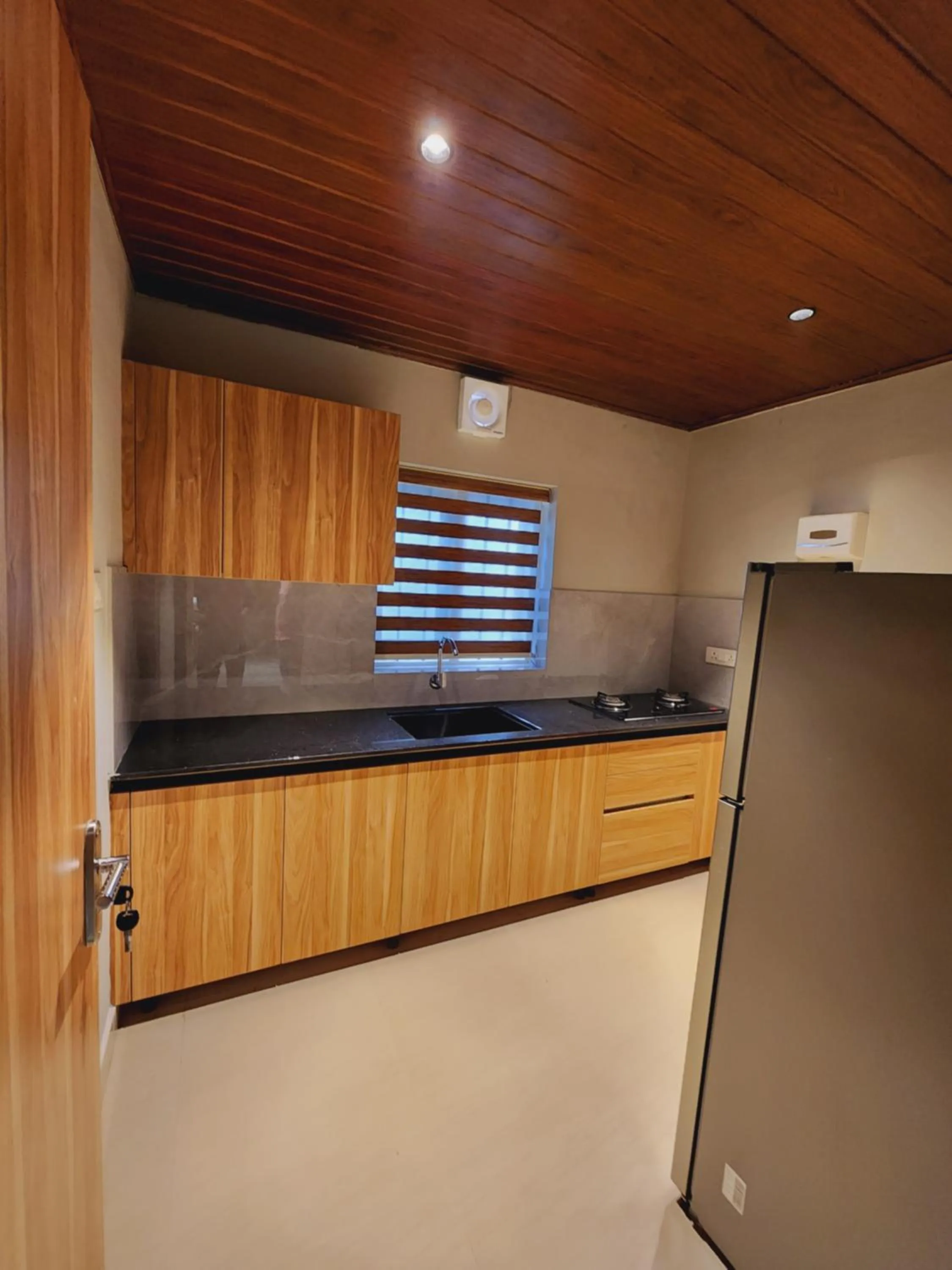 Kitchen or kitchenette in Muziris Manor Residency