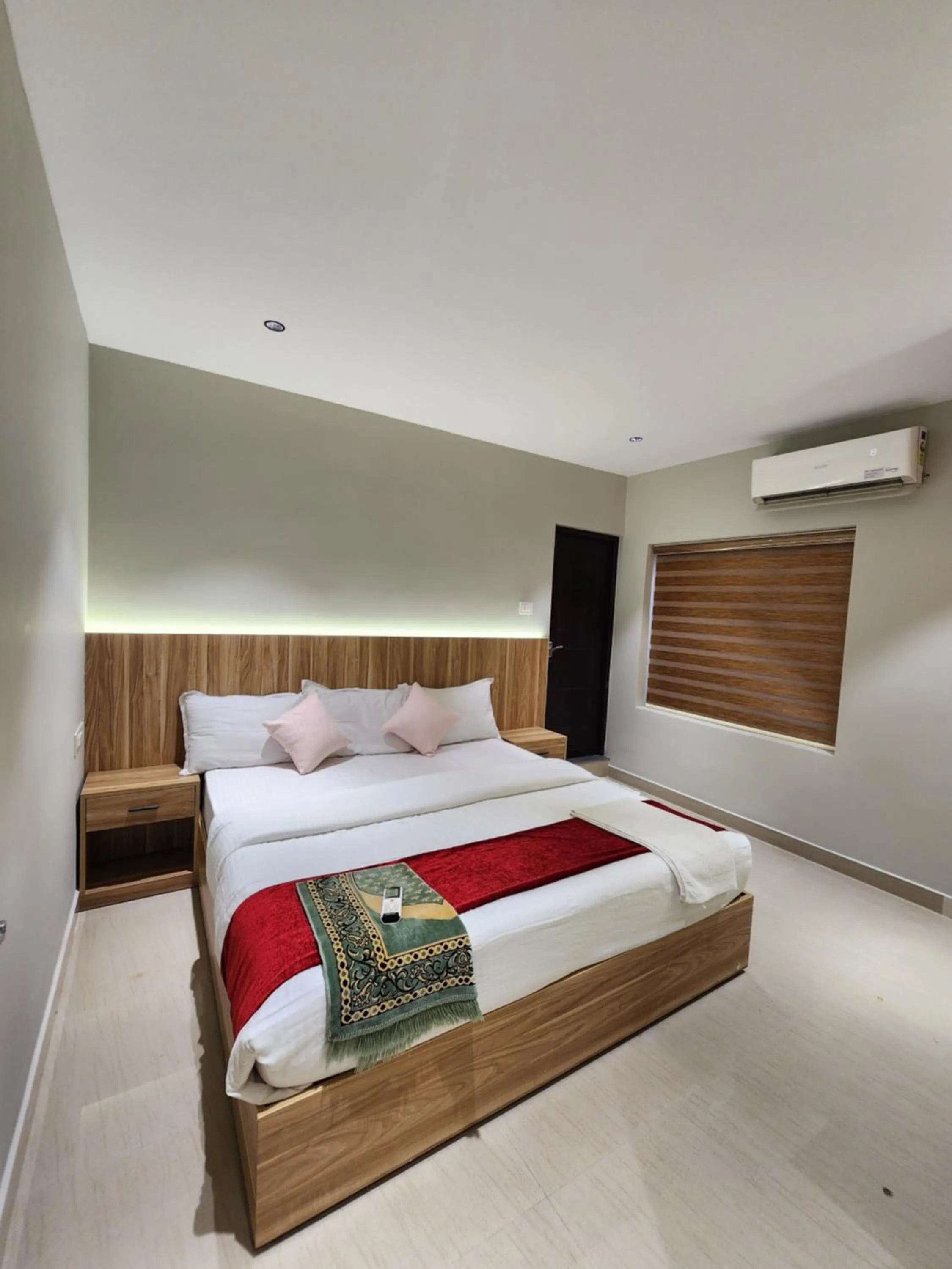 Bed in Muziris Manor Residency