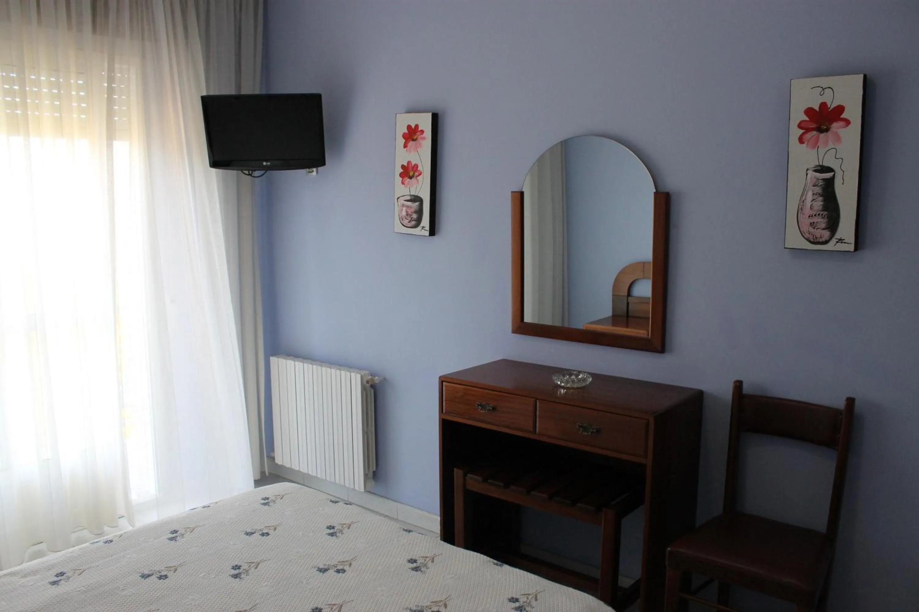 TV and multimedia, Bed in Hotel Arco Iris