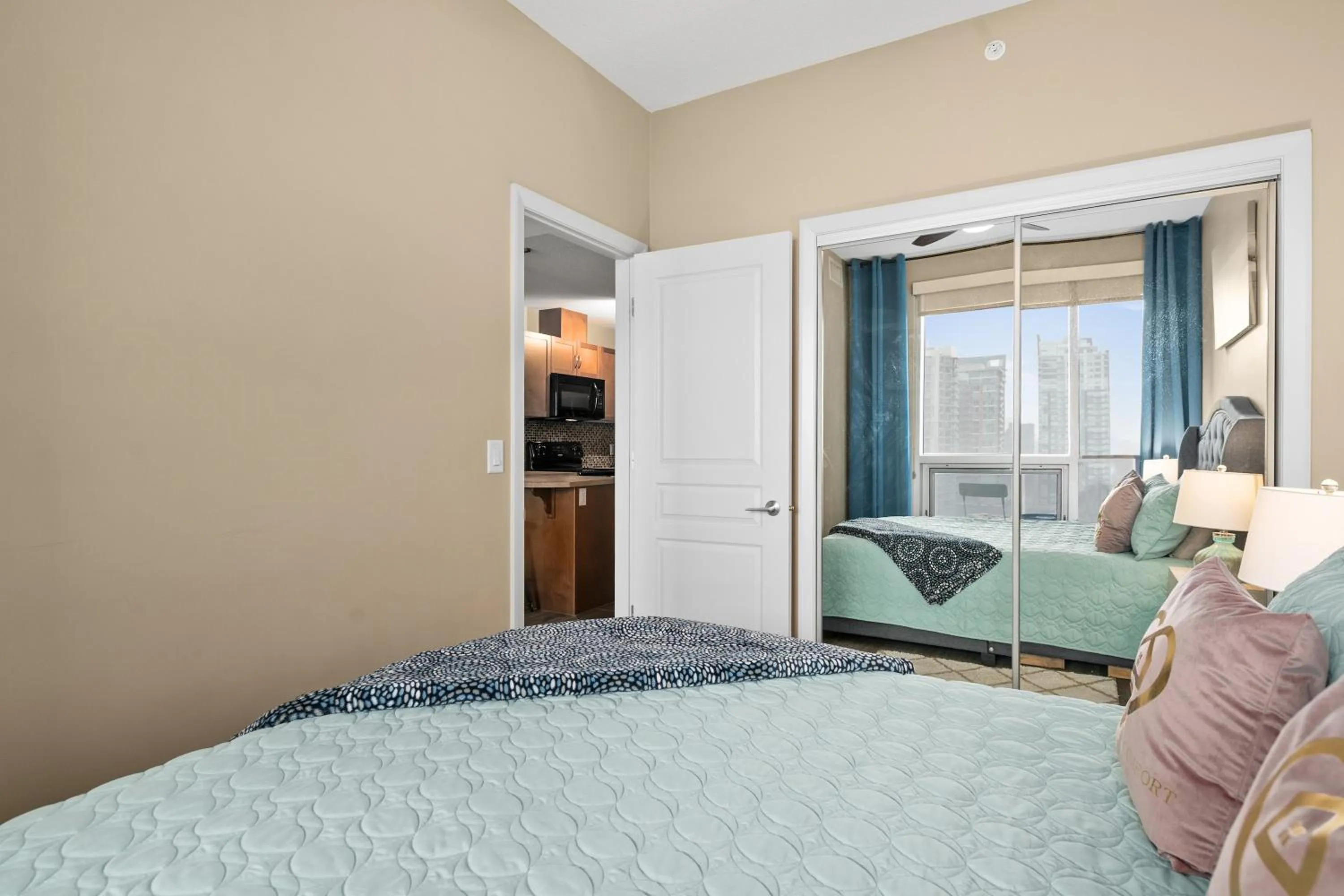 Bed in Stylish Downtown Condos by GLOBALSTAY
