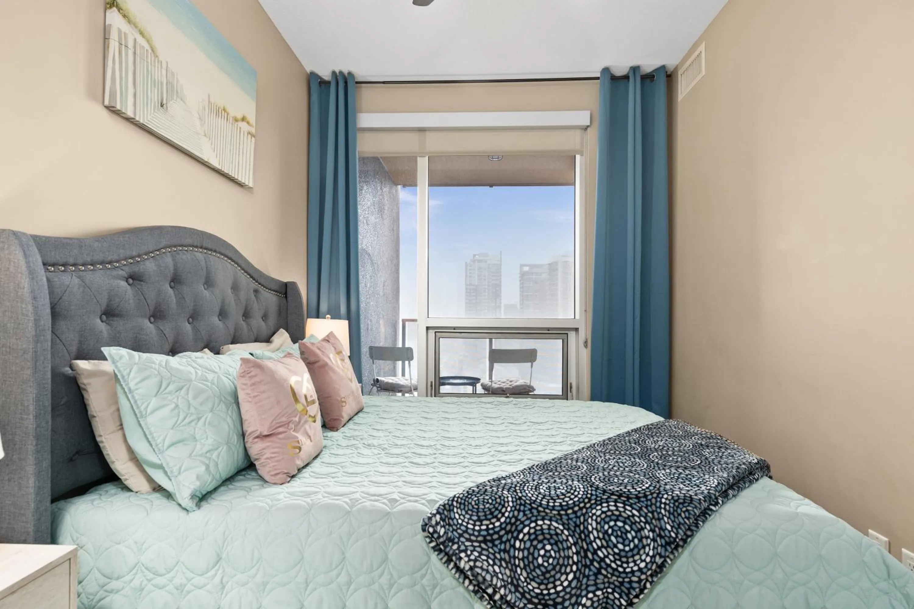 Bed in Stylish Downtown Condos by GLOBALSTAY