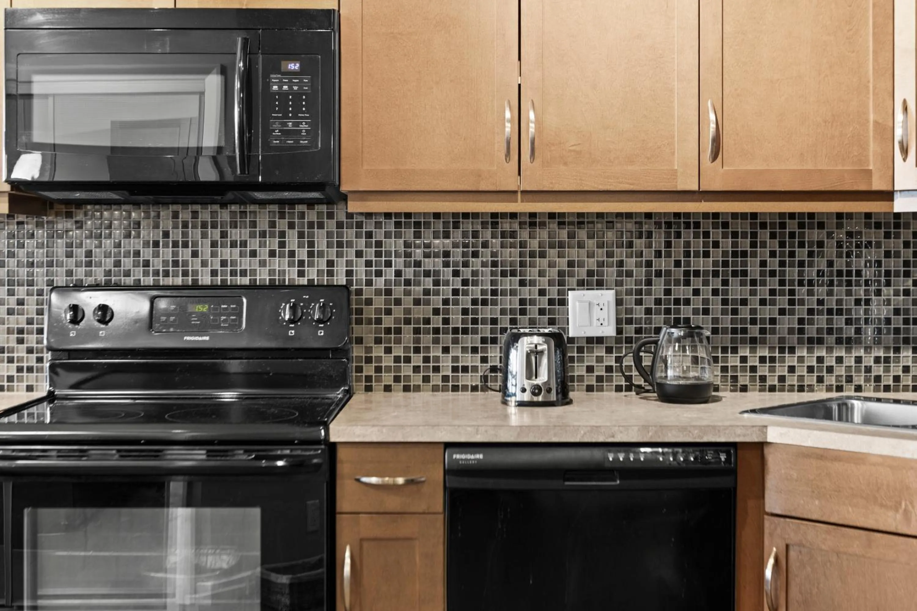 Kitchen or kitchenette in GlobalStay Downtown Calgary Condos