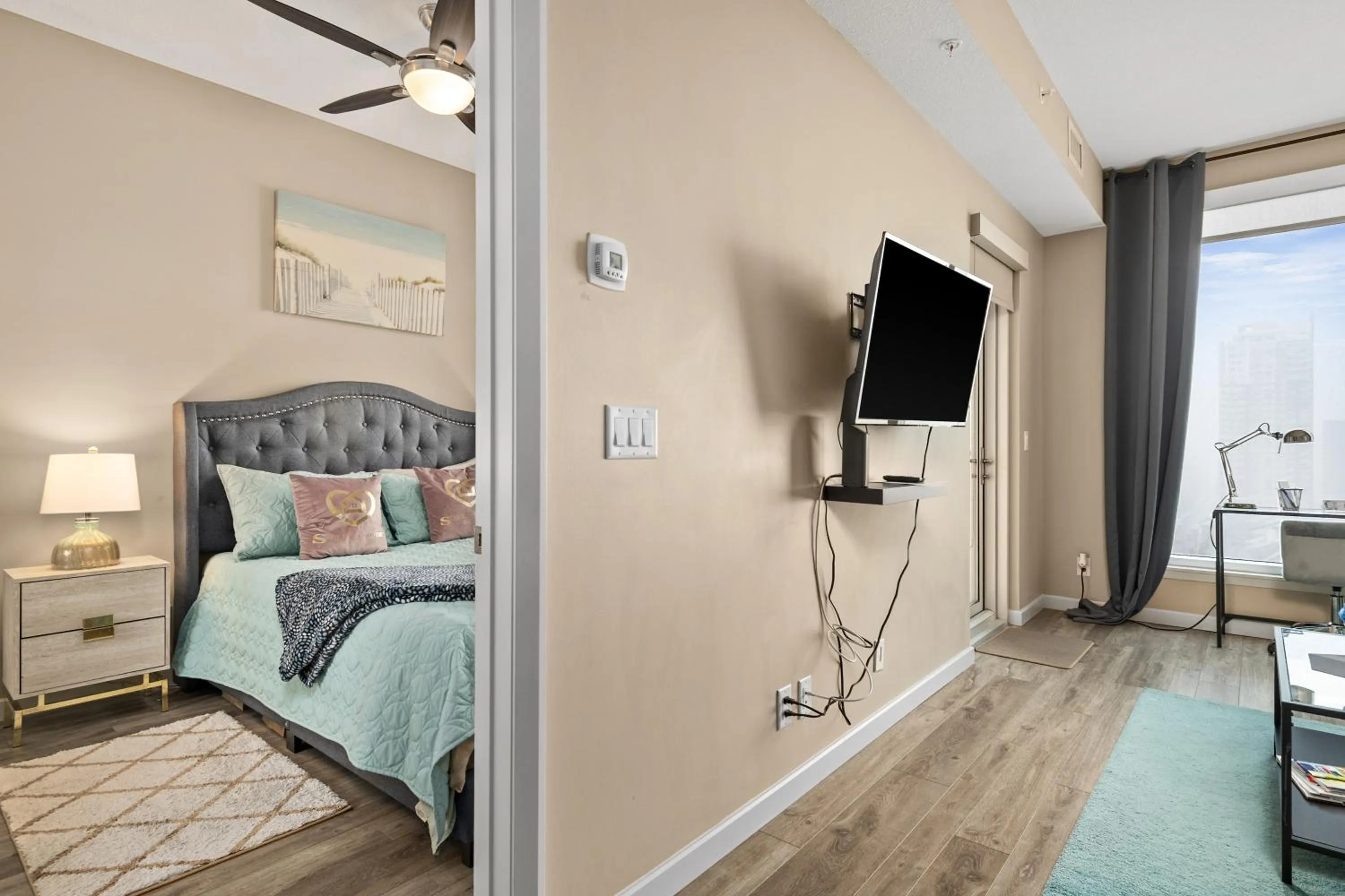 Bed in Stylish Downtown Condos by GLOBALSTAY