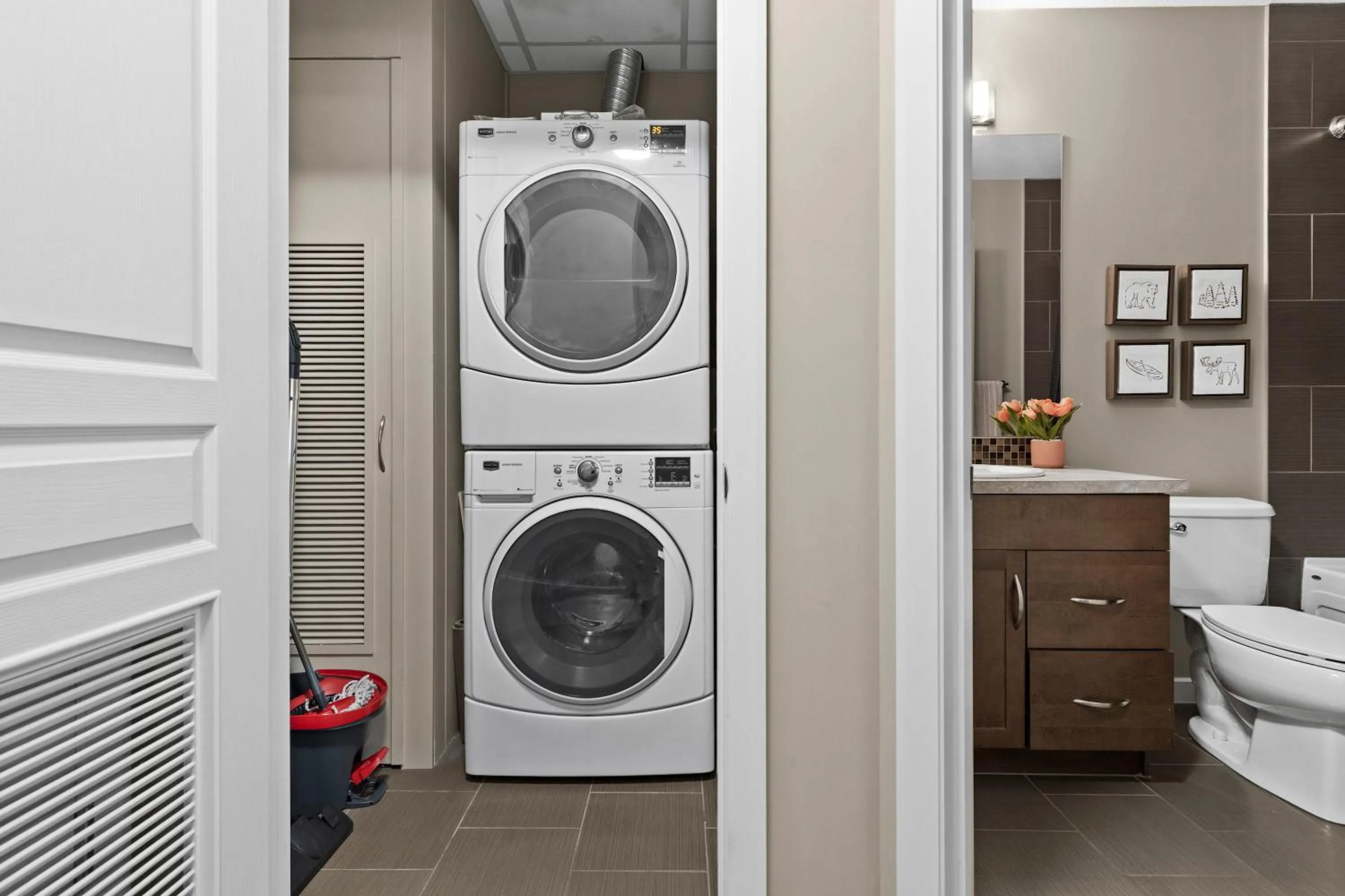 washing machine in GlobalStay Downtown Calgary Condos