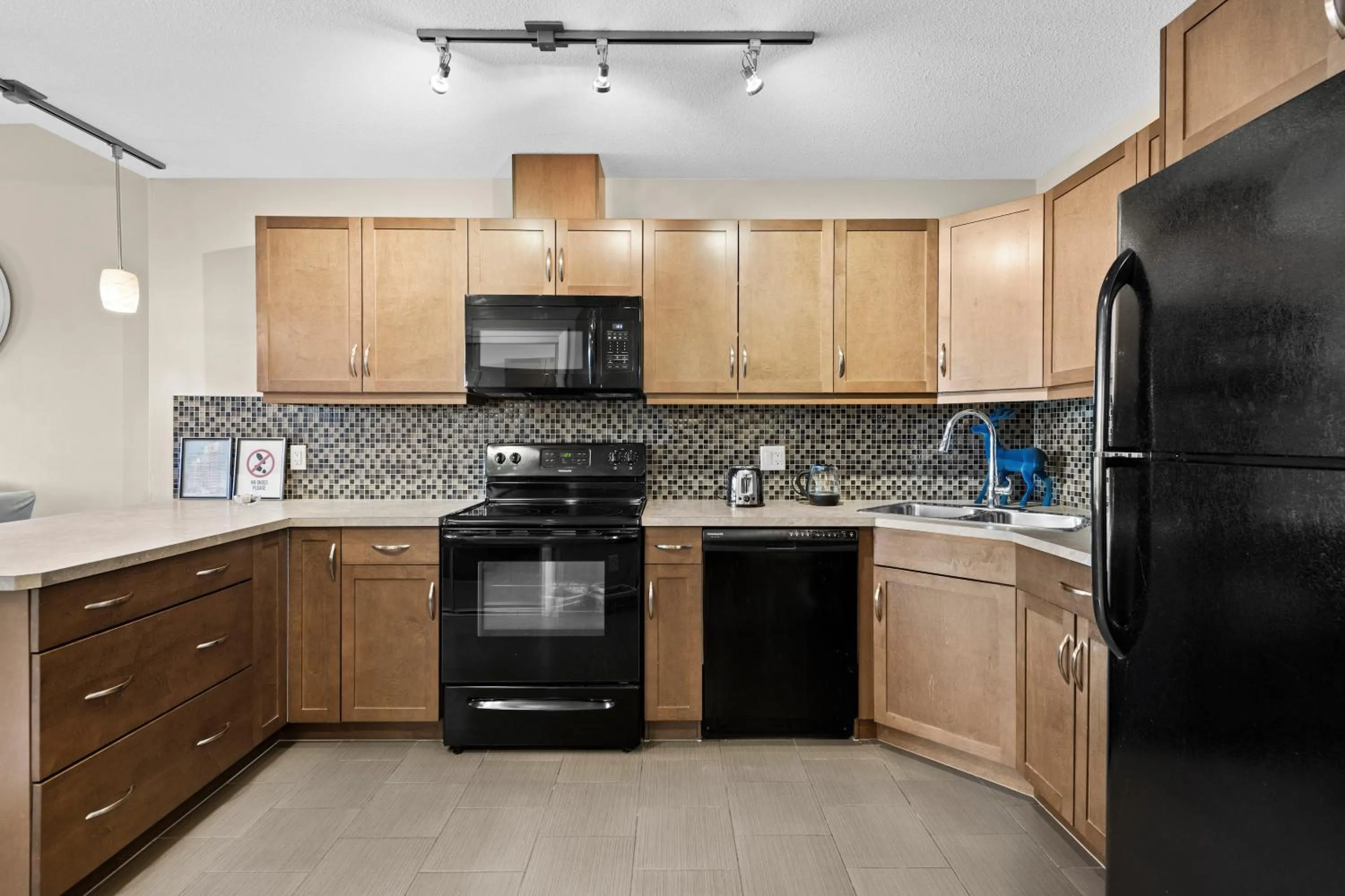 Kitchen or kitchenette in GlobalStay Downtown Calgary Condos