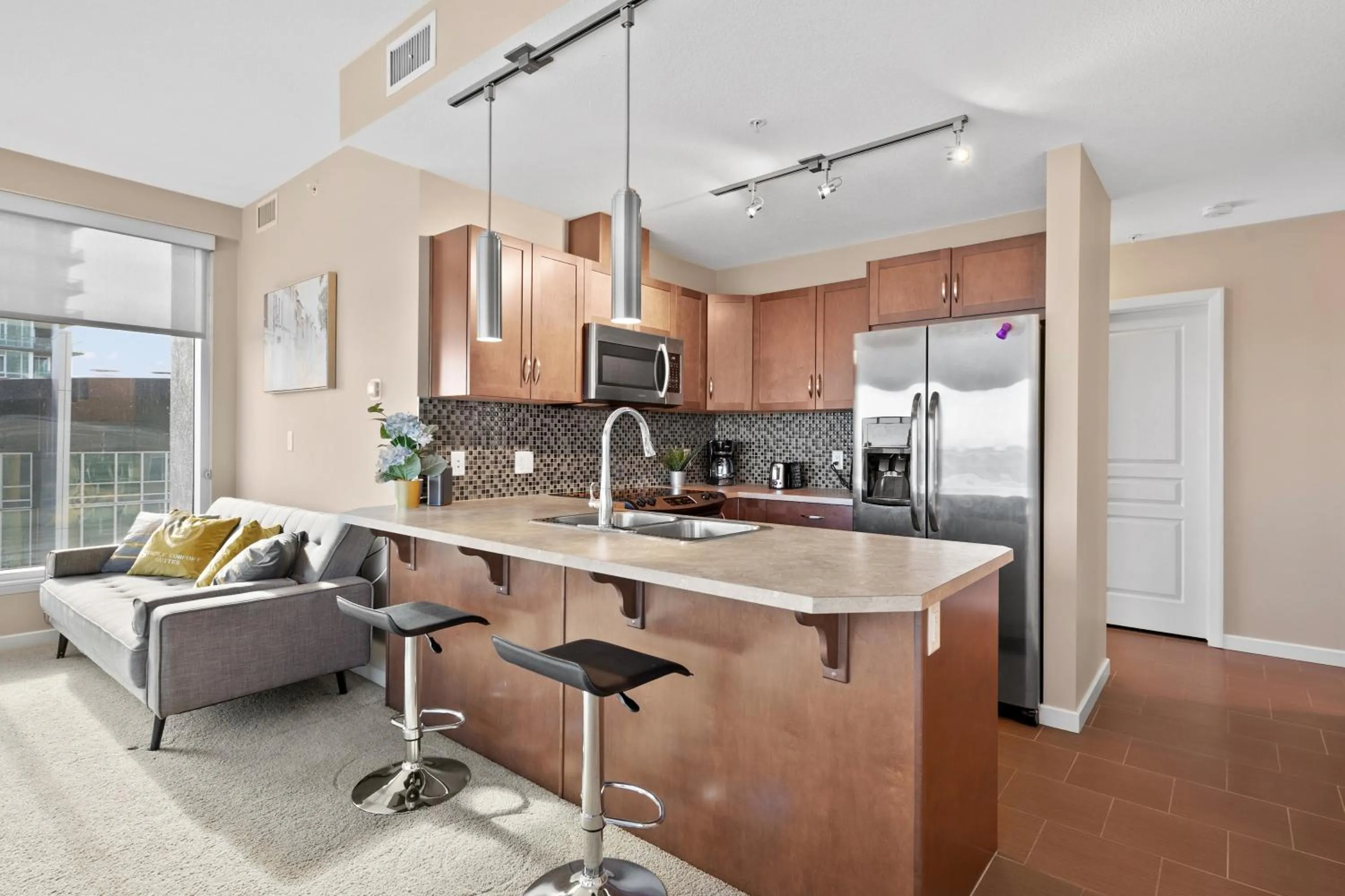 kitchen in Stylish Downtown Condos by GLOBALSTAY