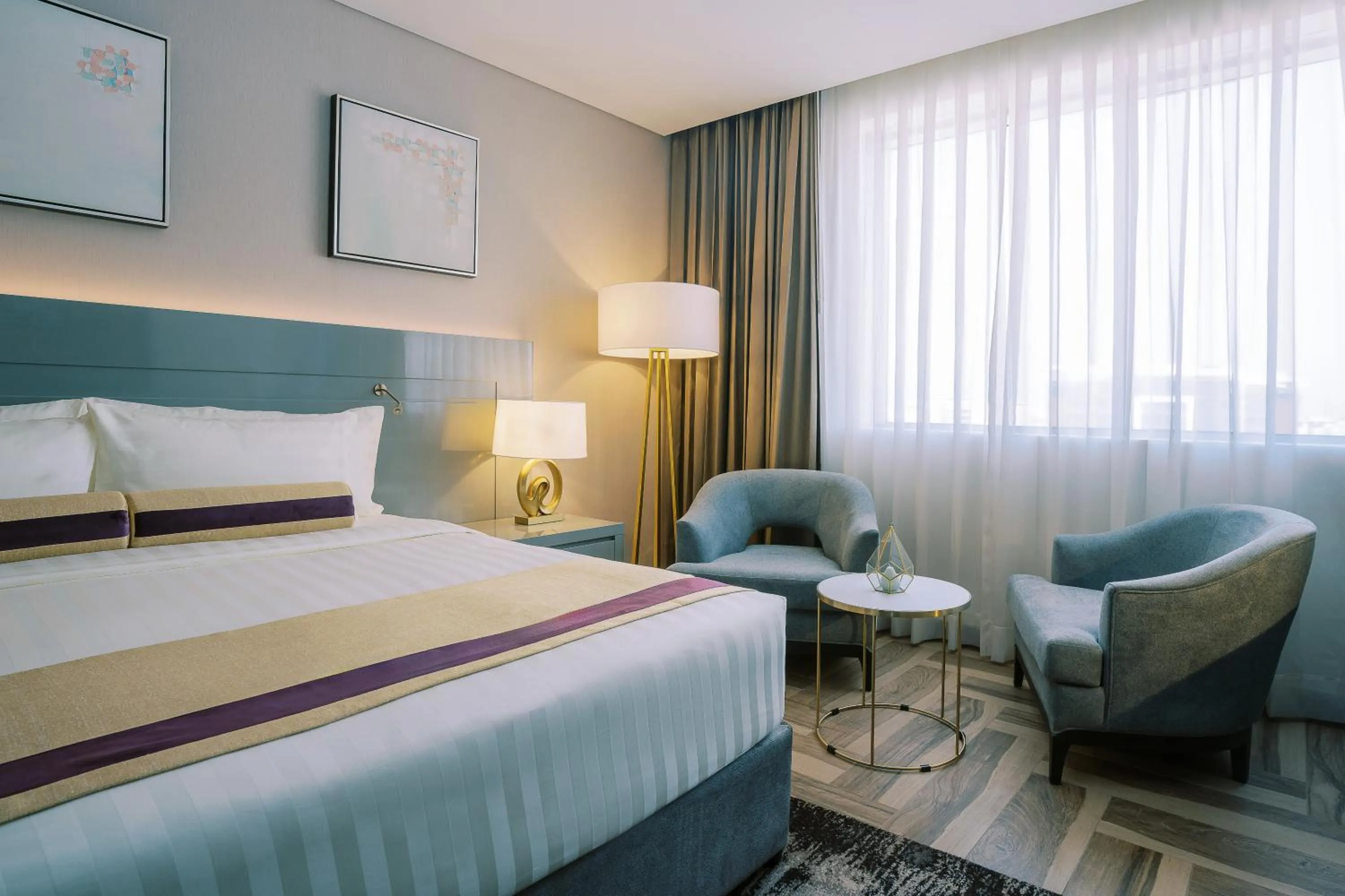 Bed in Khalidia Palace Hotel Dubai by Mourouj Gloria