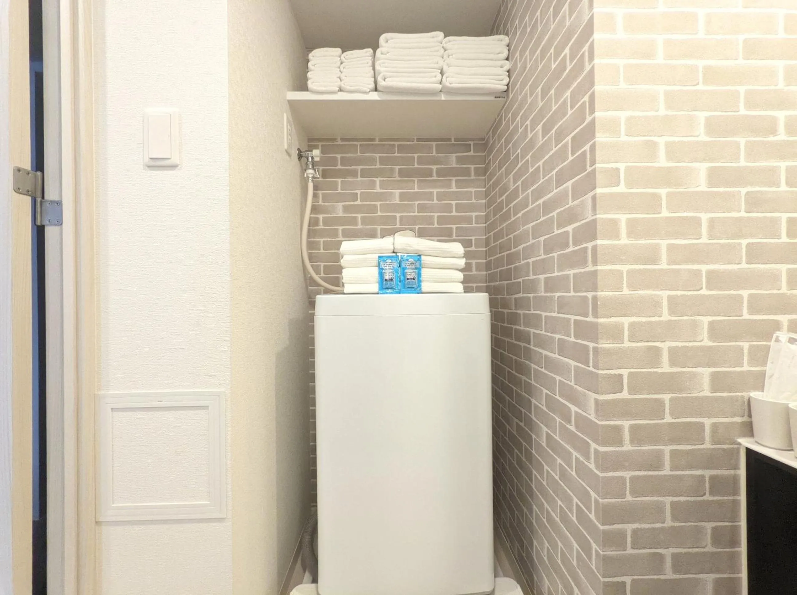 washing machine in ESLEAD HOTEL Namba Daikokucho