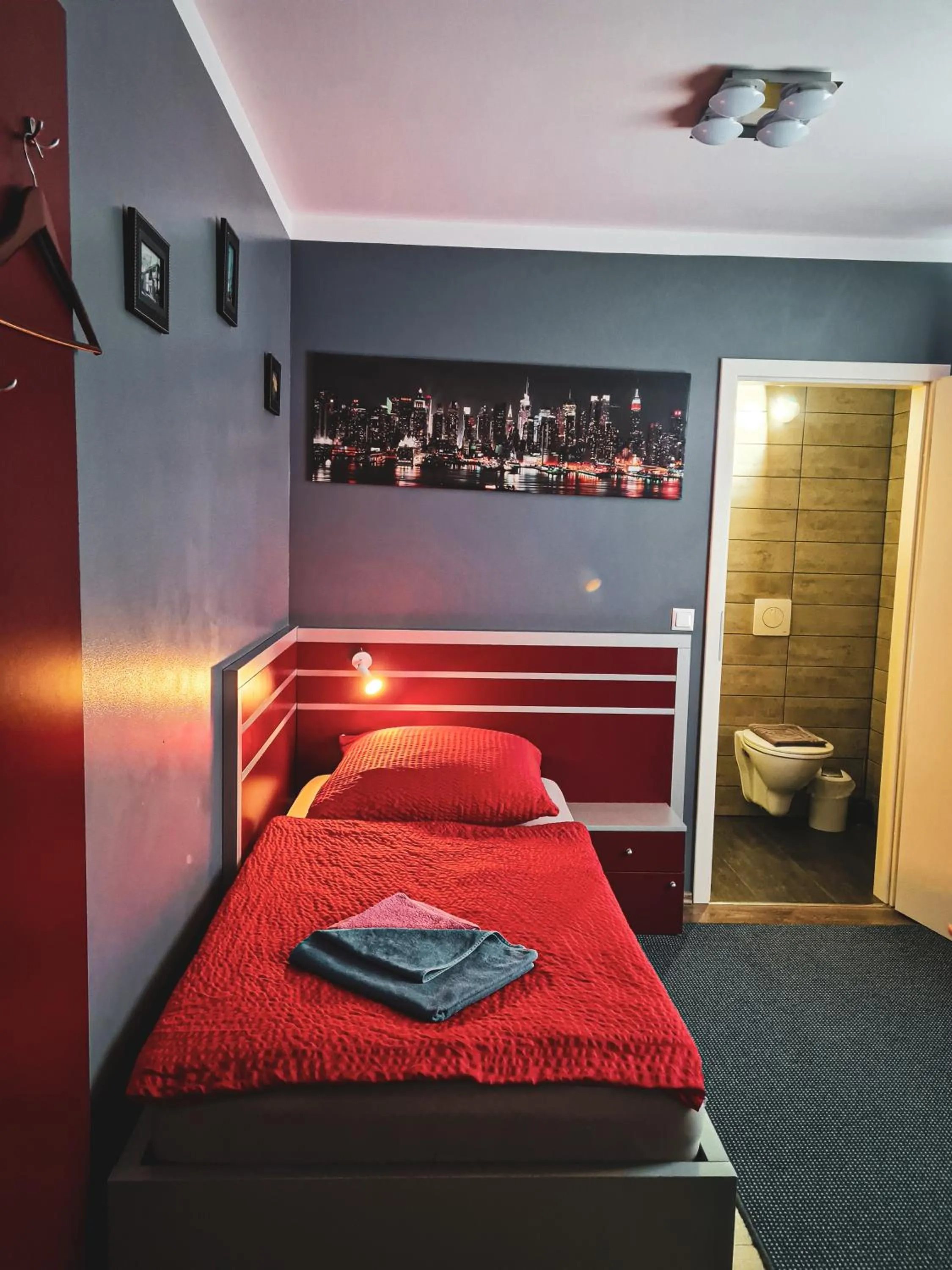 Toilet, Bed in Hotel 108